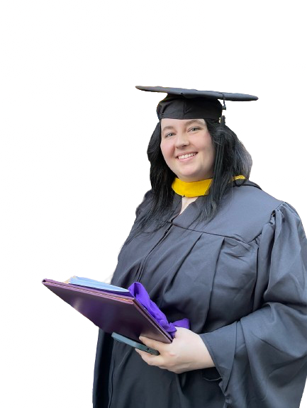 A young woman in graduation cap and gown smiling and holding a diploma during a graduation ceremony.