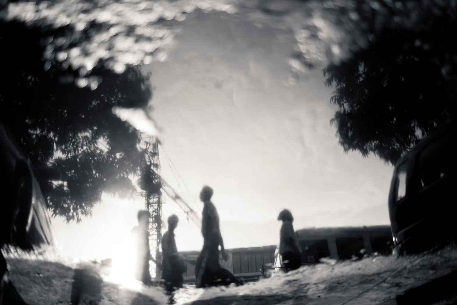 Reflection of pedestrians near Sule Pagoda, Yangon