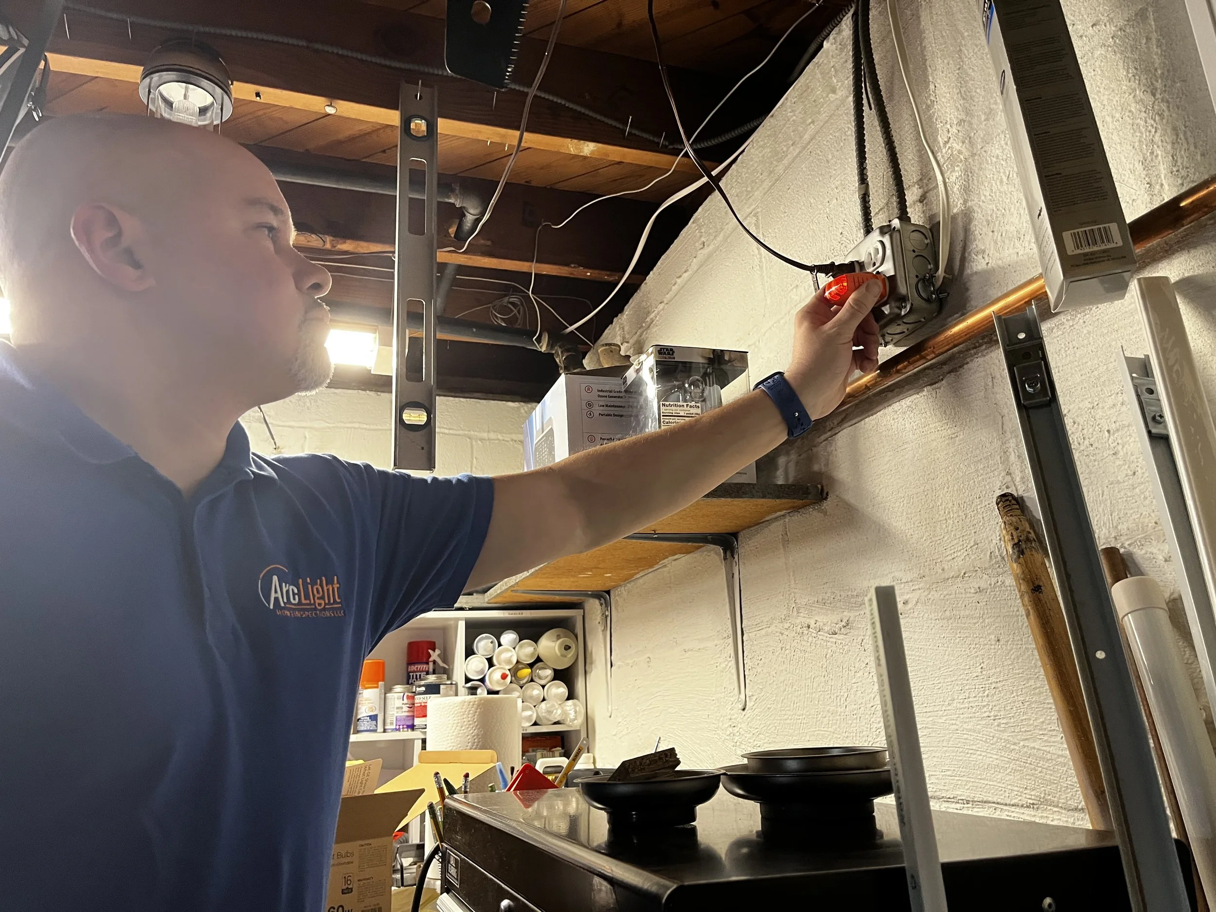 James Morales from Arc light home inspections performing a residential home inspection electrical