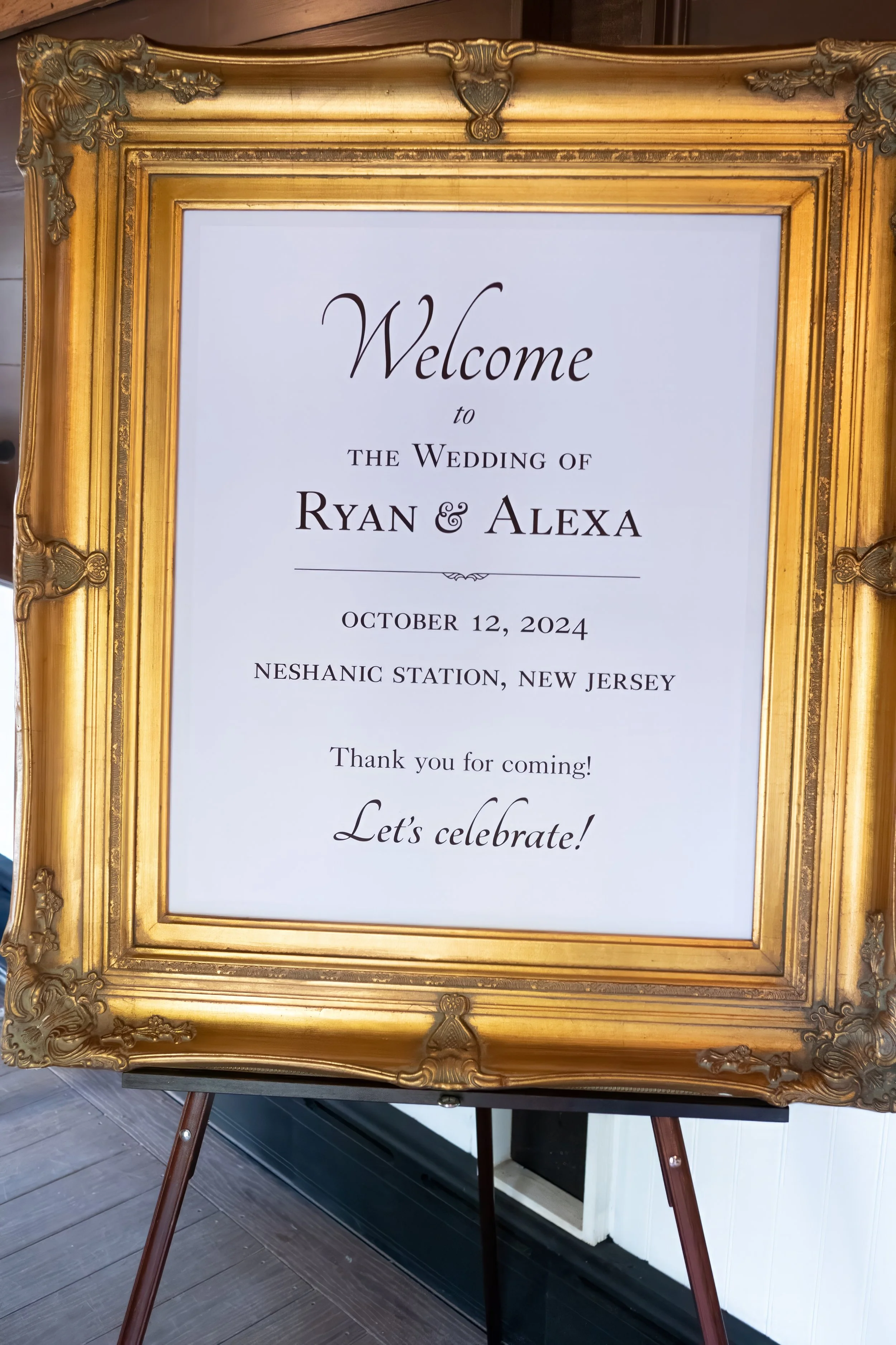Welcome sign for wedding in Neshanic Station, New Jersey with a gold ornate frame.