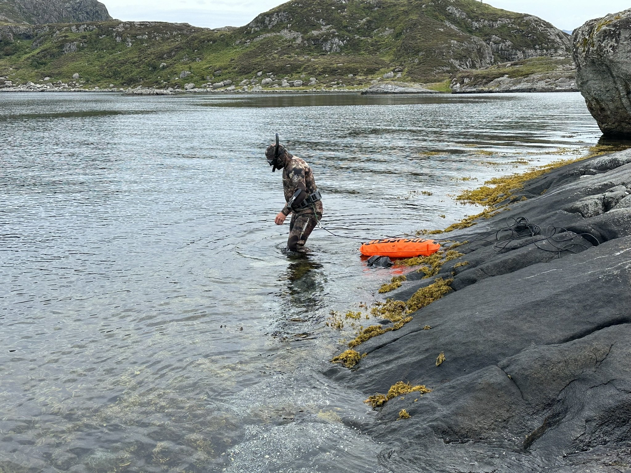 Freediving in the Norwegian fjords during a private luxury expedition
