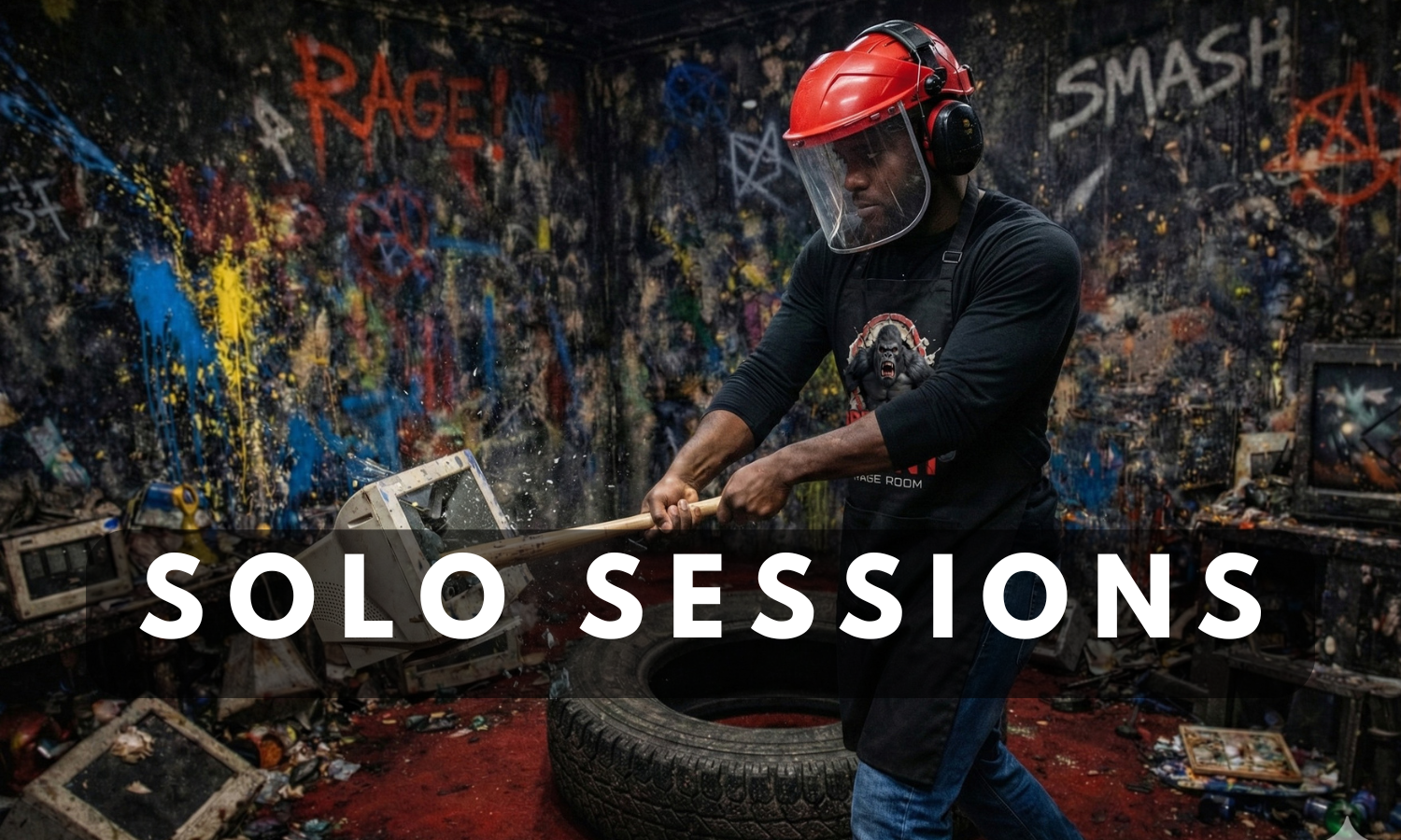 Man releasing stress by smashing a computer monitor with a baseball bat during a solo rage room session Breaking Point Rage Room