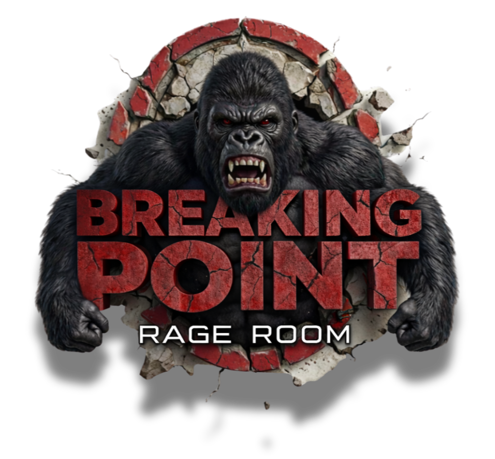 The logo for 'Breaking Point Rage Room' featuring a fierce gorilla breaking through a brick wall with the text in bold letters.