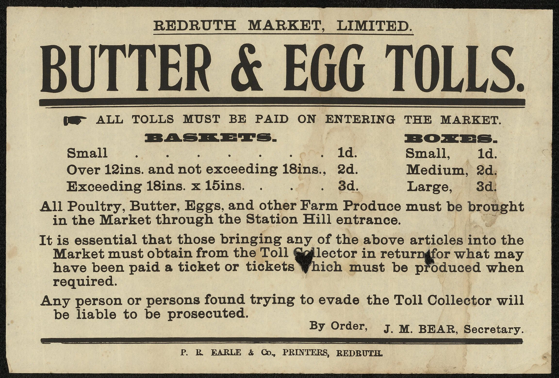 An old printed notice from Redruth Market, Limited, regarding the sale of butter and egg trolleys. The notice details pricing for different basket sizes and states all poultry, butter, and eggs must be brought into the market through the station hill entrance.