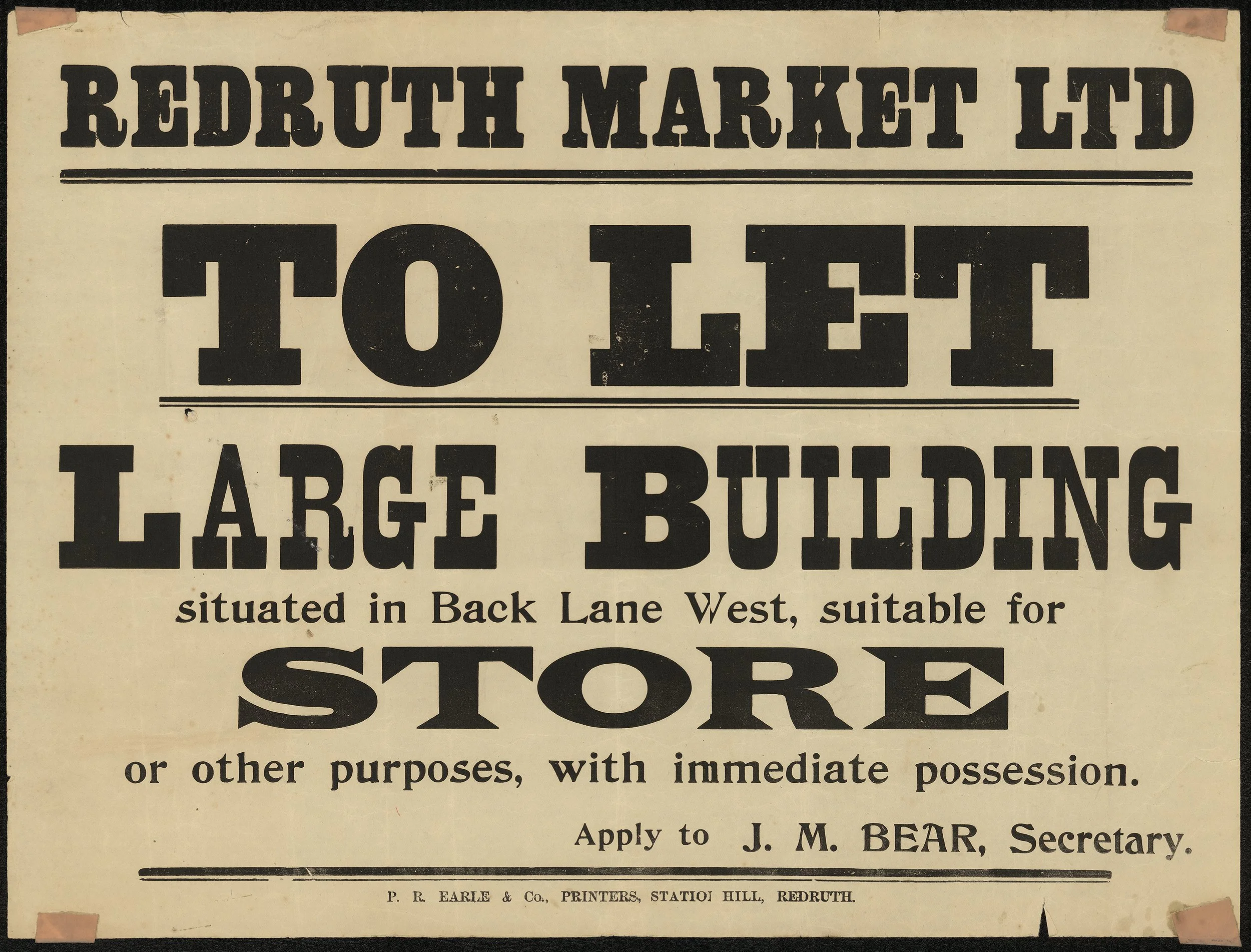 A vintage advertisement poster for a Redruth market trading at TOLLETT. The poster indicates the market's location in Back Lane West and describes the trade of large building materials or other purposes with immediate possession. It also mentions app