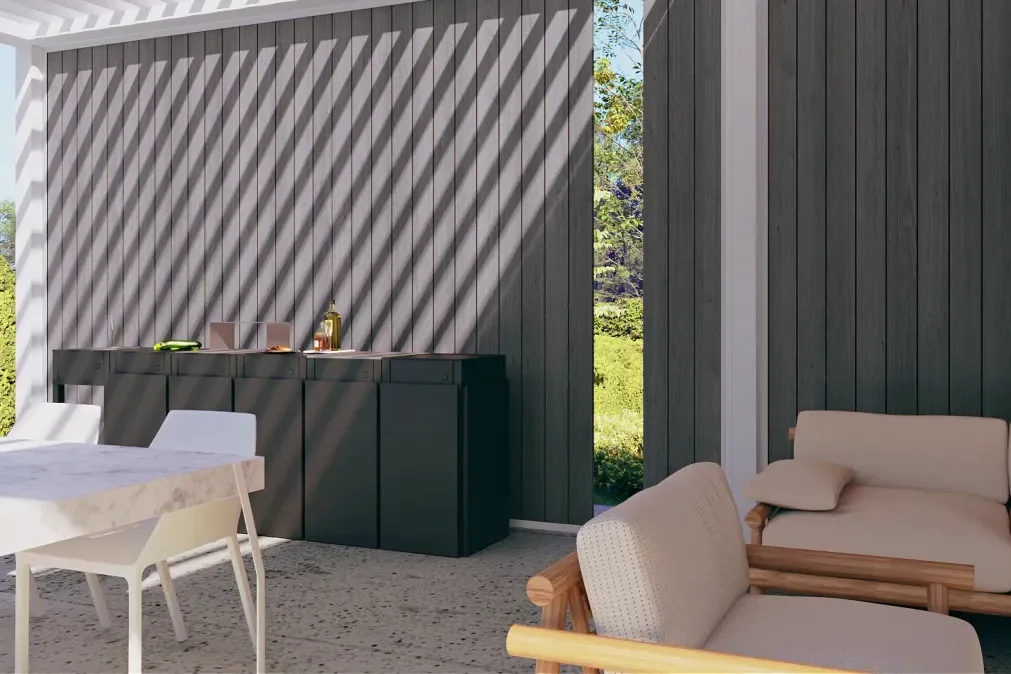 Outdoor dining and seating area with dark wood walls, a white marble table, white modern chairs, and beige cushioned seating, with sunlight creating striped shadows on the wall.
