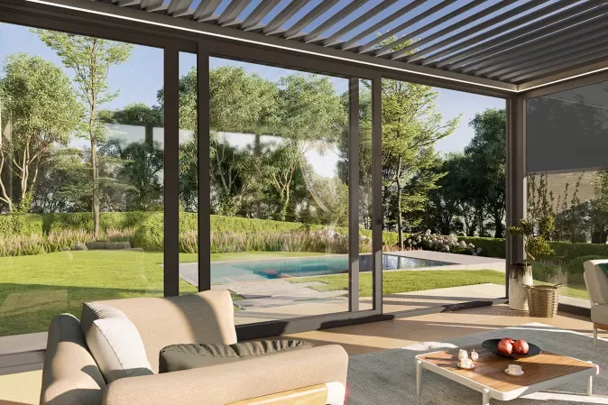 Modern living room with large sliding glass doors opening to a backyard with a lawn, trees, and a swimming pool.