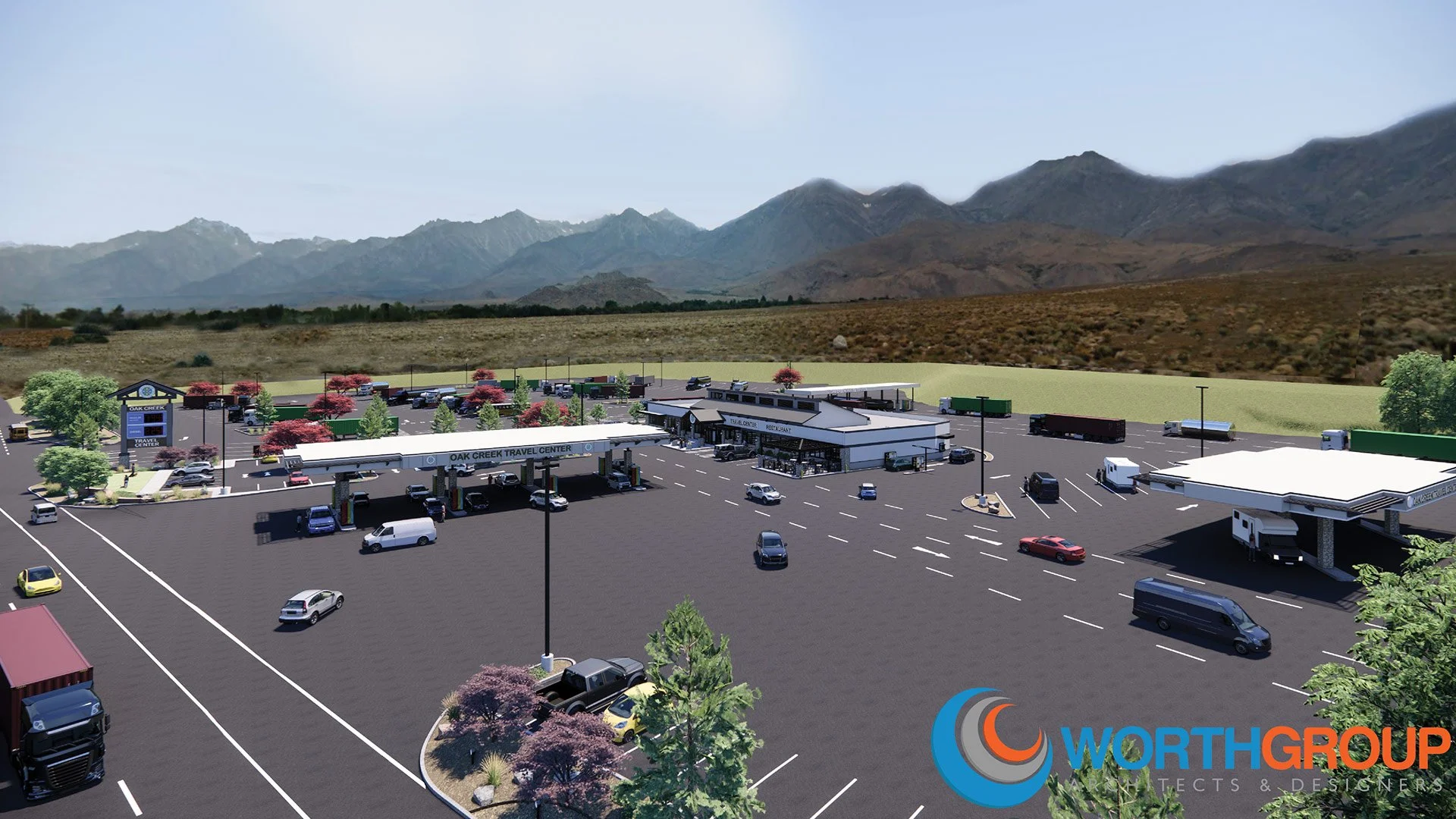 A large parking lot with multiple lanes, trees, and a travel center building labeled "OAK CREEK TRAVEL CENTER" with fuel pumps outside. There are various cars and trucks parked and driving in the lot, set against a backdrop of mountains and open land