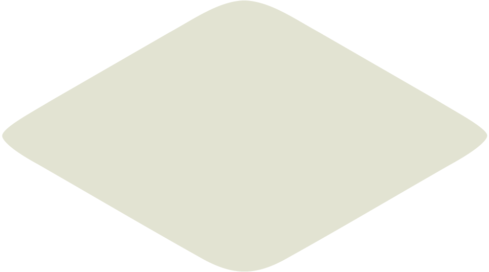 A light-colored, textured surface with a square shape and rounded corners.