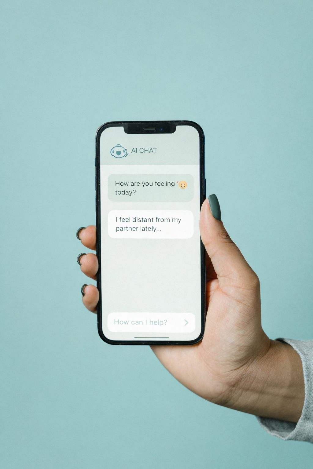 A person holding a smartphone displays a chat conversation with an AI chat bot about feeling distant from their partner.
