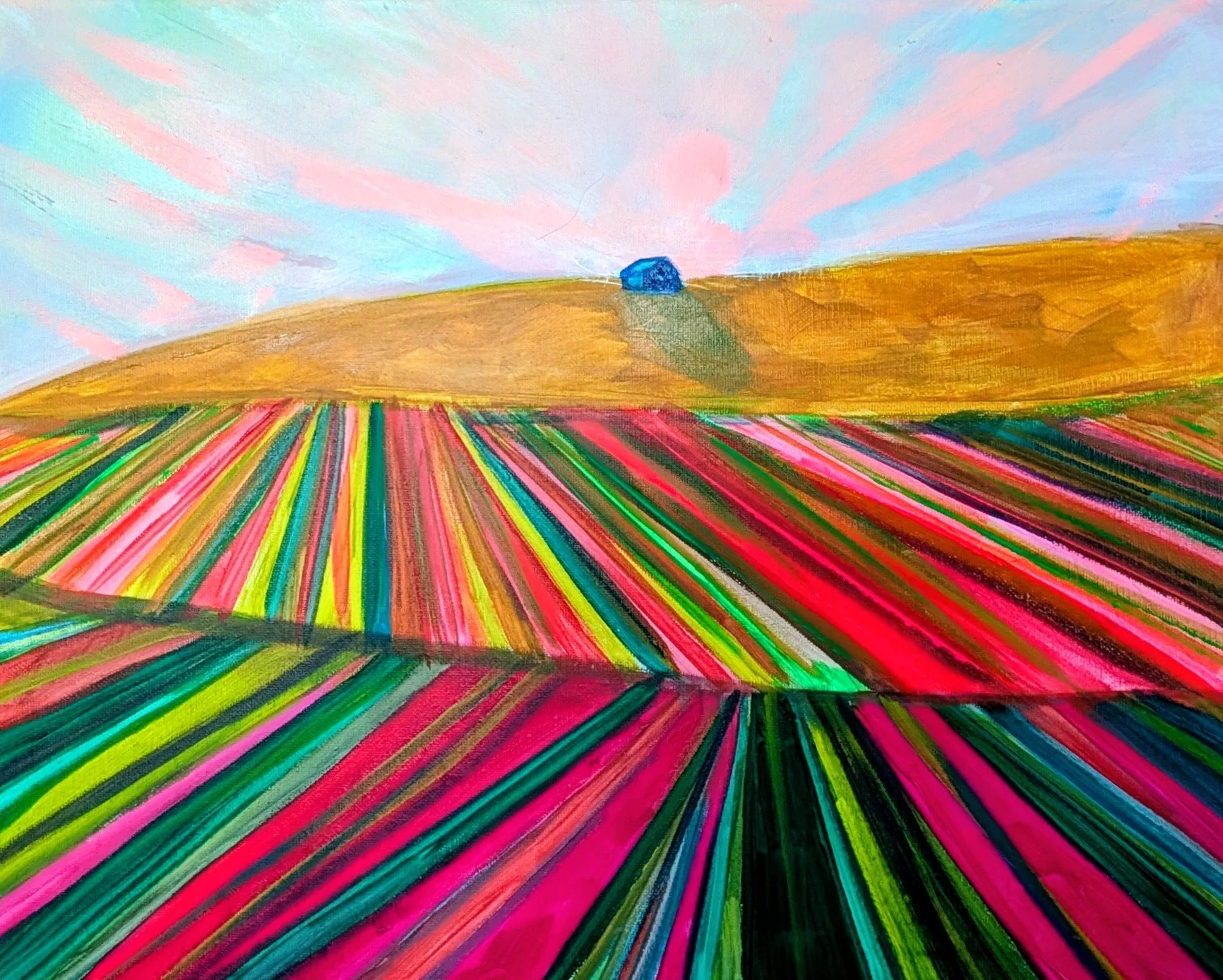 Colorful painting of a farm field with stripes of pink, green, yellow, and black, a blue barn or hill, and a sky with pink clouds.