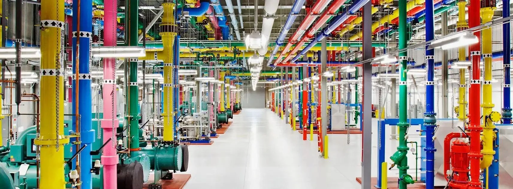 Industrial piping system with color coded pipes and valves