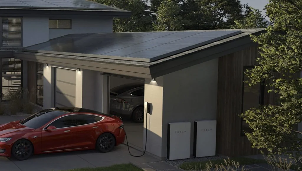 Computer generated rendering of two story home, with red Tesla in driveway, plugged into Tesla charge, another Tesla is parked in the garage.