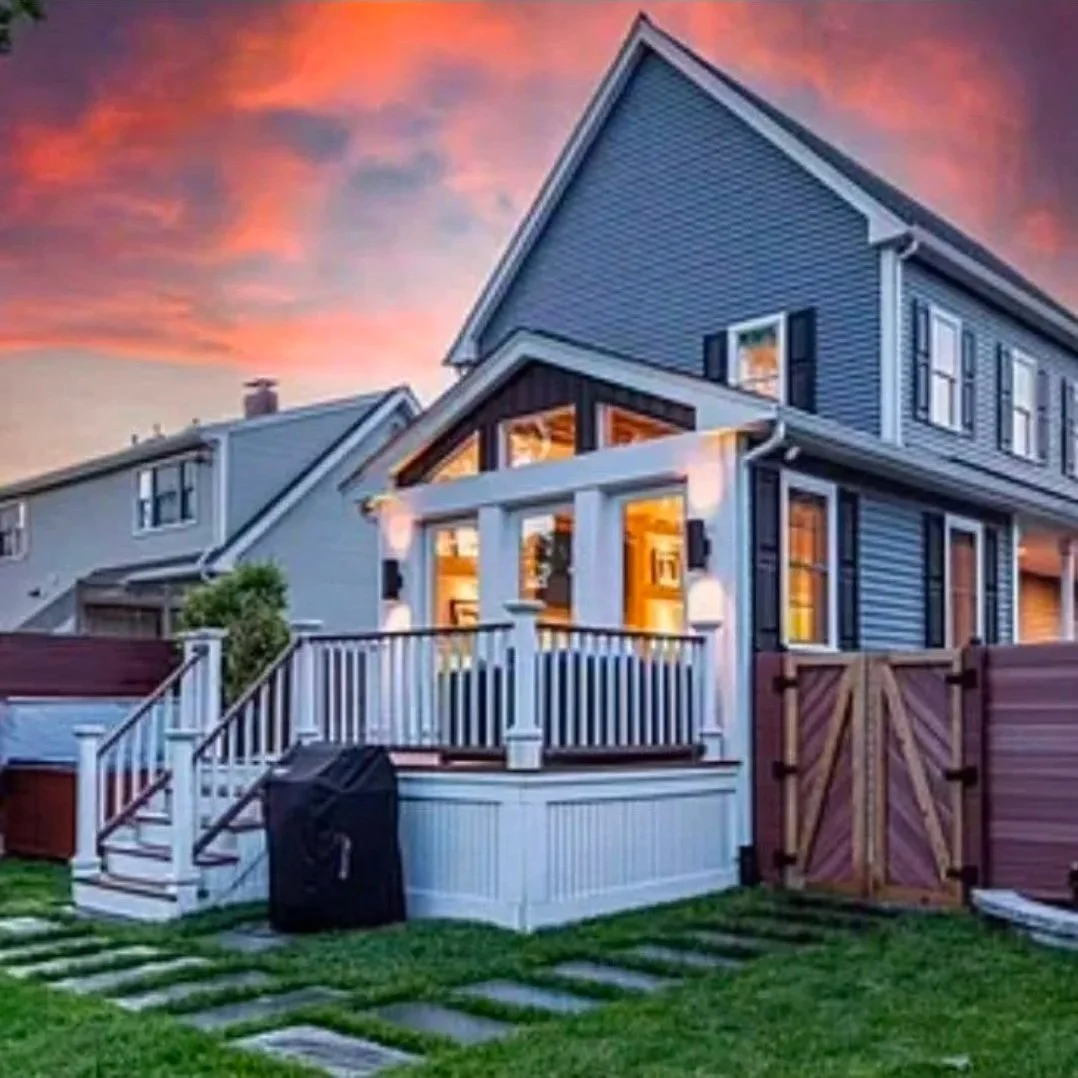 Great room addition to home with attached deck