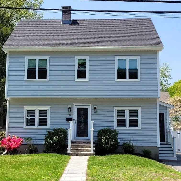 Second-story addition transforming a single-level home into a two-story residence