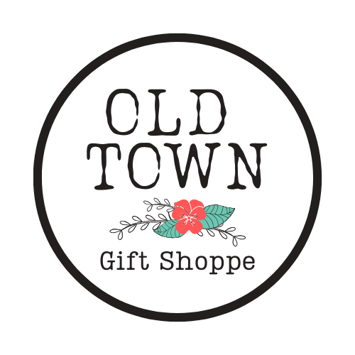 Logo for Old Town Gift Shoppe featuring a pink flower, leaves, and white accents on a black background.