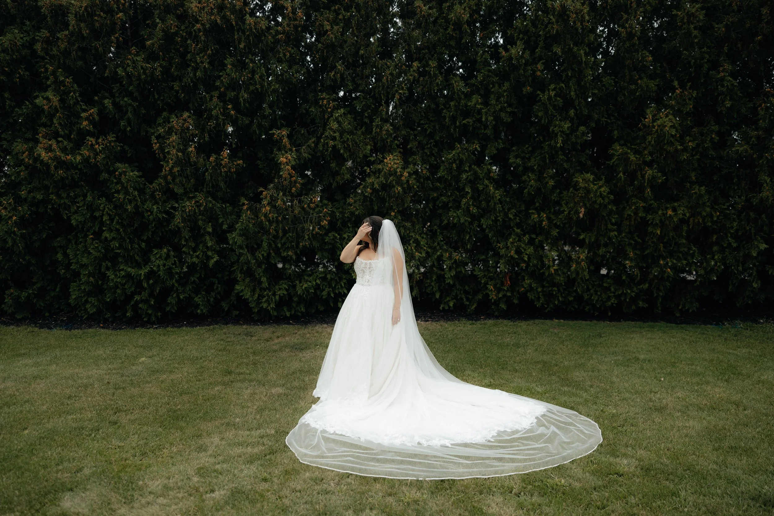Bride getting ready filled with greenery at Greystone Golf Club wedding venue in Washington, Michigan.