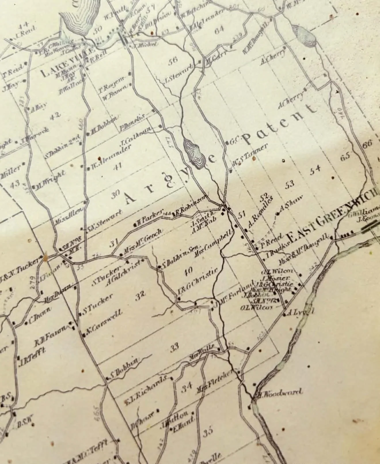 Historical map showing parcels of land with roads, stream, and place names, including patches labeled 'Pate' and 'East Chew