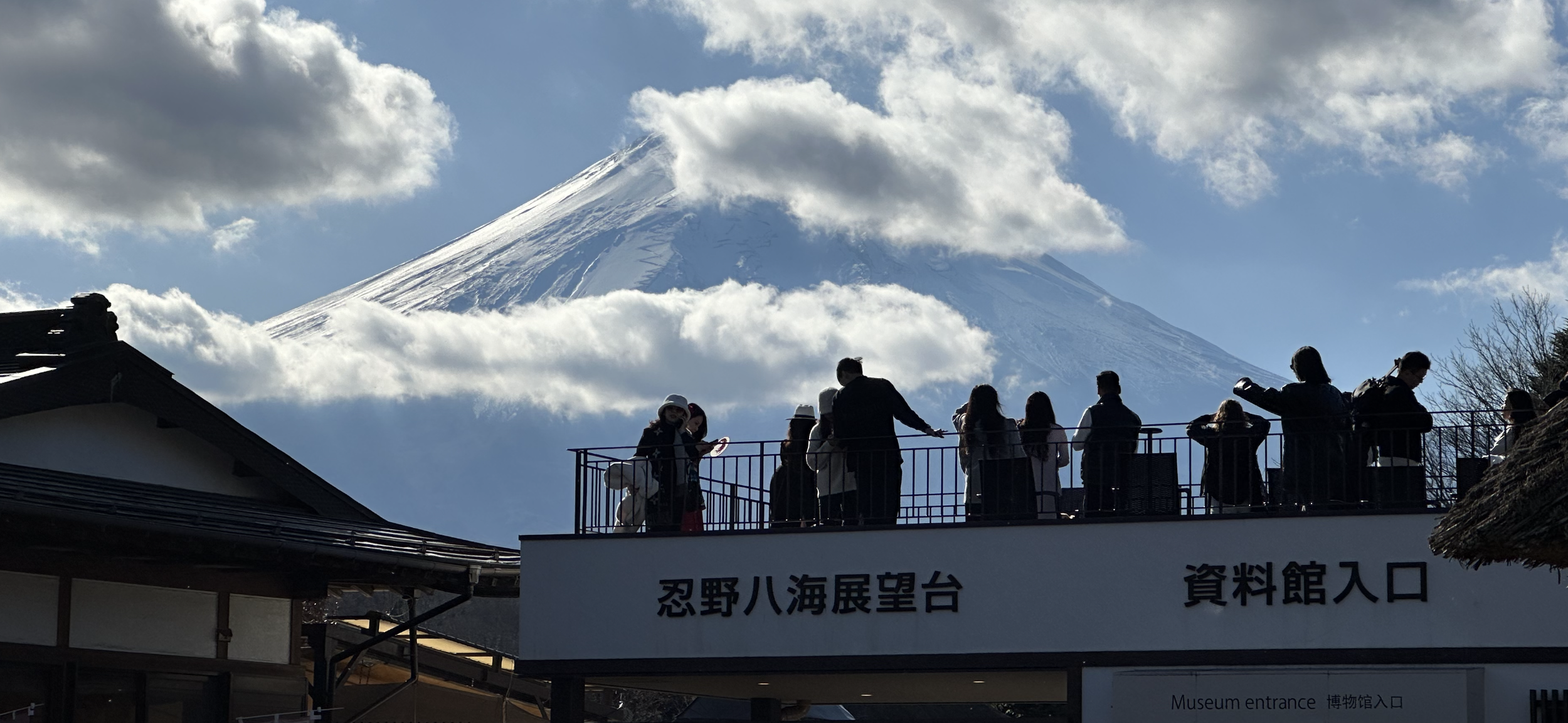 Mount Fuji emerging through clouds, reflecting permanence and clarity in spiritual inquiry