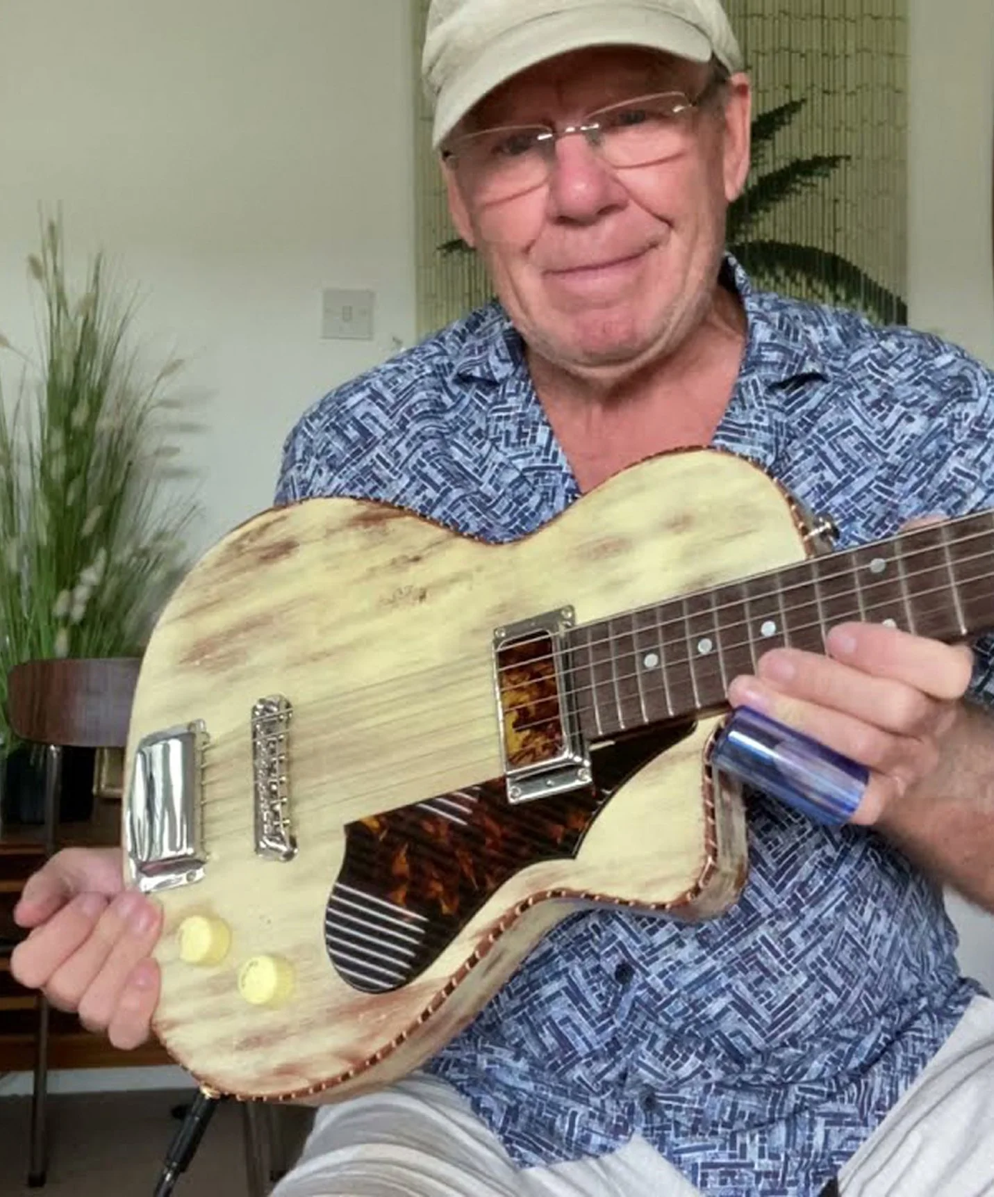 Kevin Brown with Nymph guitar, electric guitar with acoustic character, handcrafted for expressive fingerstyle and blues players