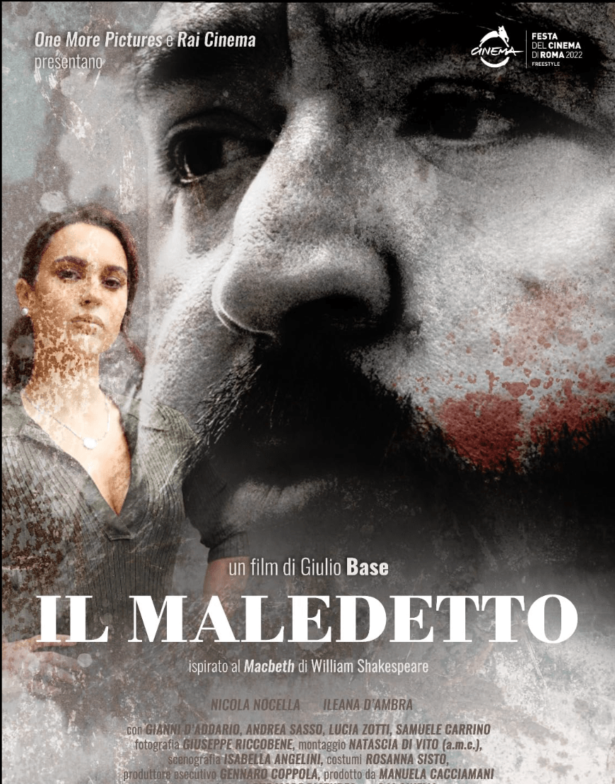 Movie poster for 'Il Maledetto' featuring a large close-up of a man's face with a serious expression and a liquefied blood stain on his cheek, along with a smaller image of a woman with a stern face, wearing makeup and jewelry, and the movie title in