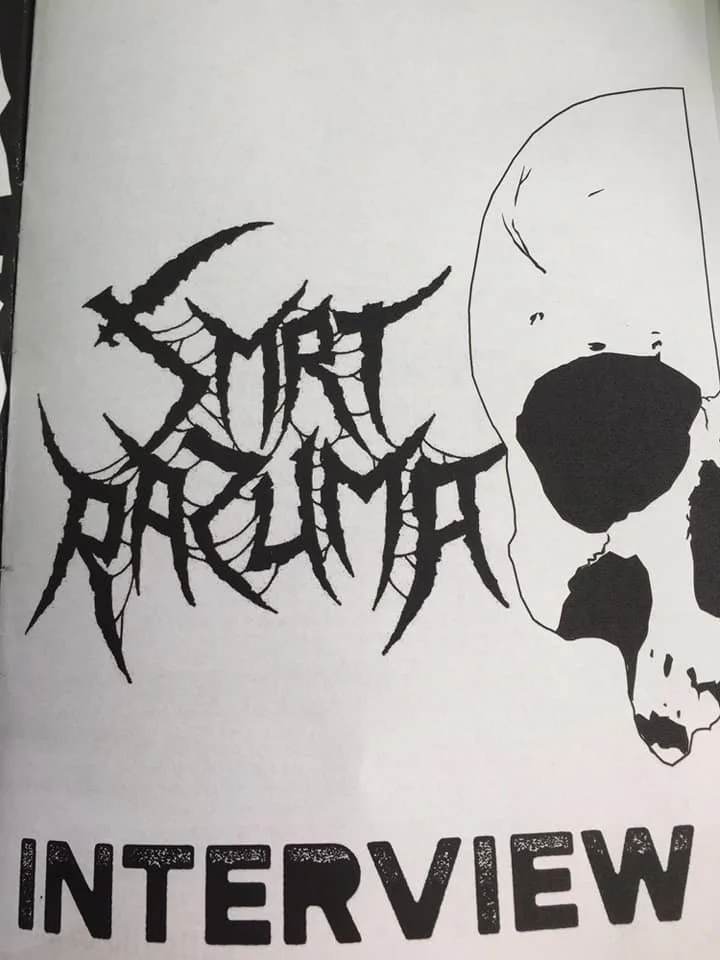 Sketch of a skull with the words "SMRT RAZUMA" in a stylized, jagged font and the word "INTERVIEW" underneath in bold, textured letters.