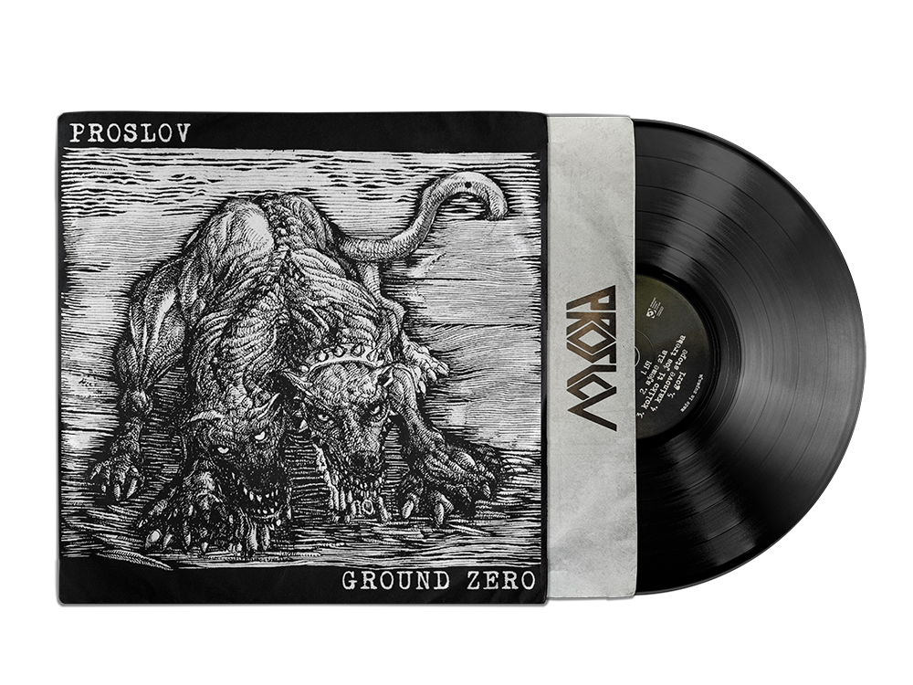 Black vinyl record partially removed from its sleeve, which features a black and white illustration of a fierce, multi-headed dog with detailed fur and snarling faces. The sleeve has 'PROSLOV' at the top and 'GROUND ZERO' at the bottom.