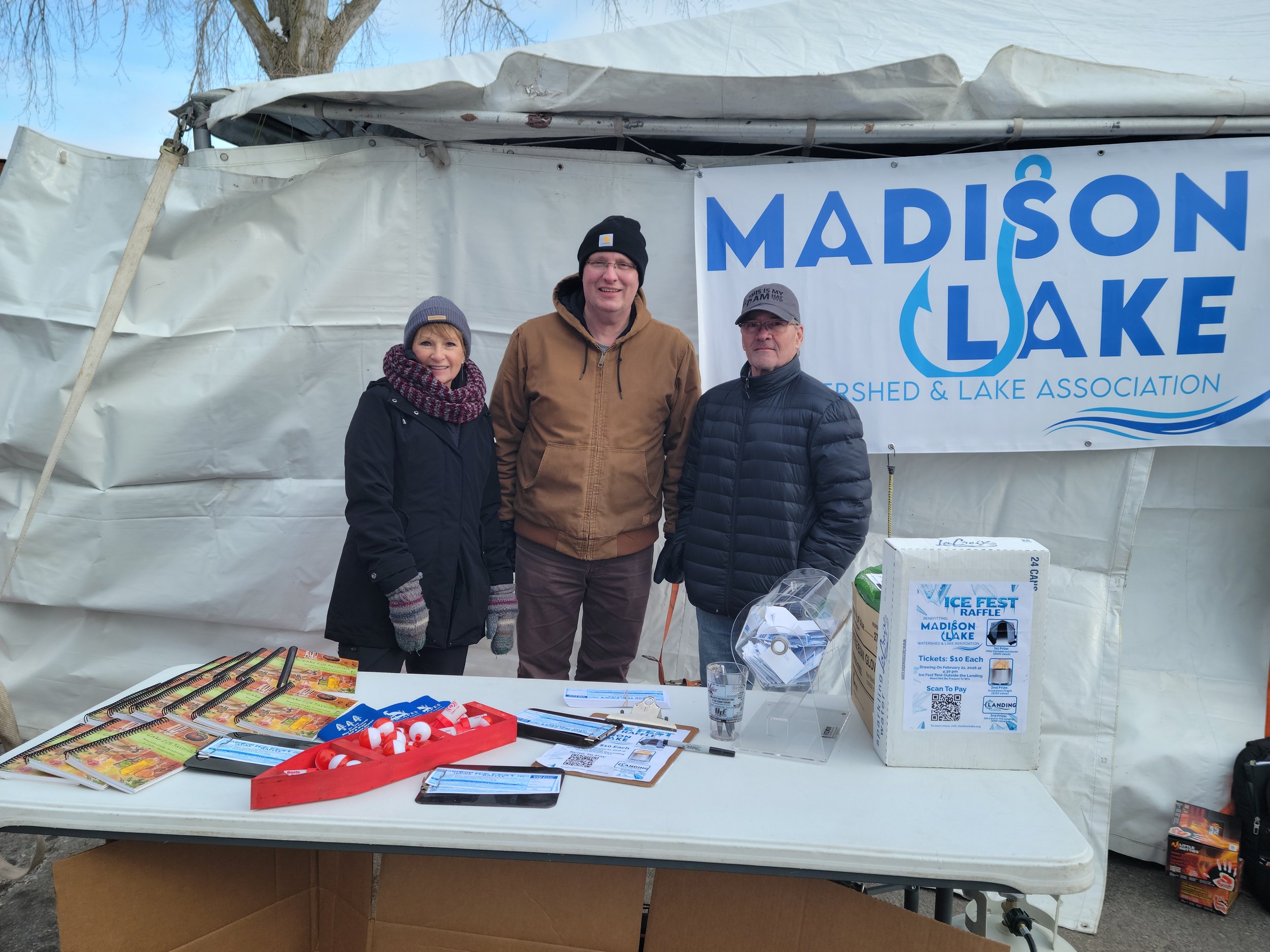 Braving the cold to sell those raffle tickets!