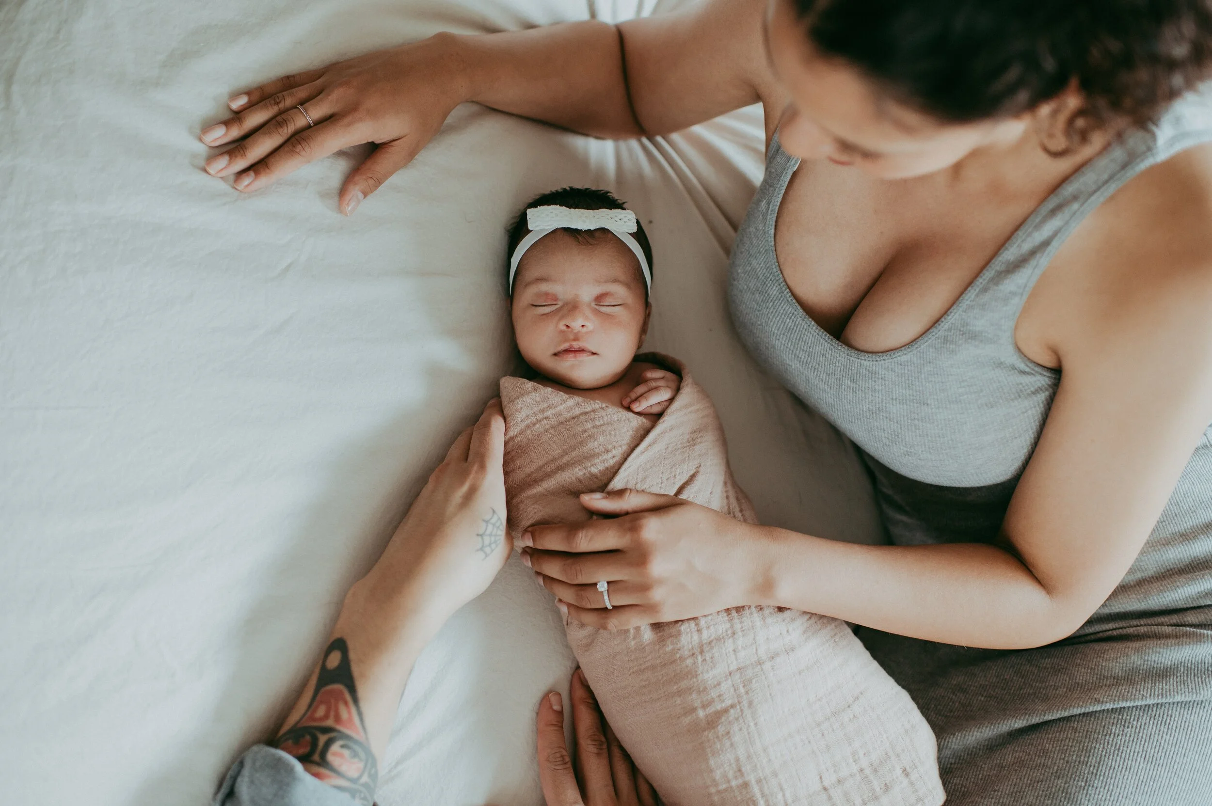 Casual newborn photo of baby swaddled