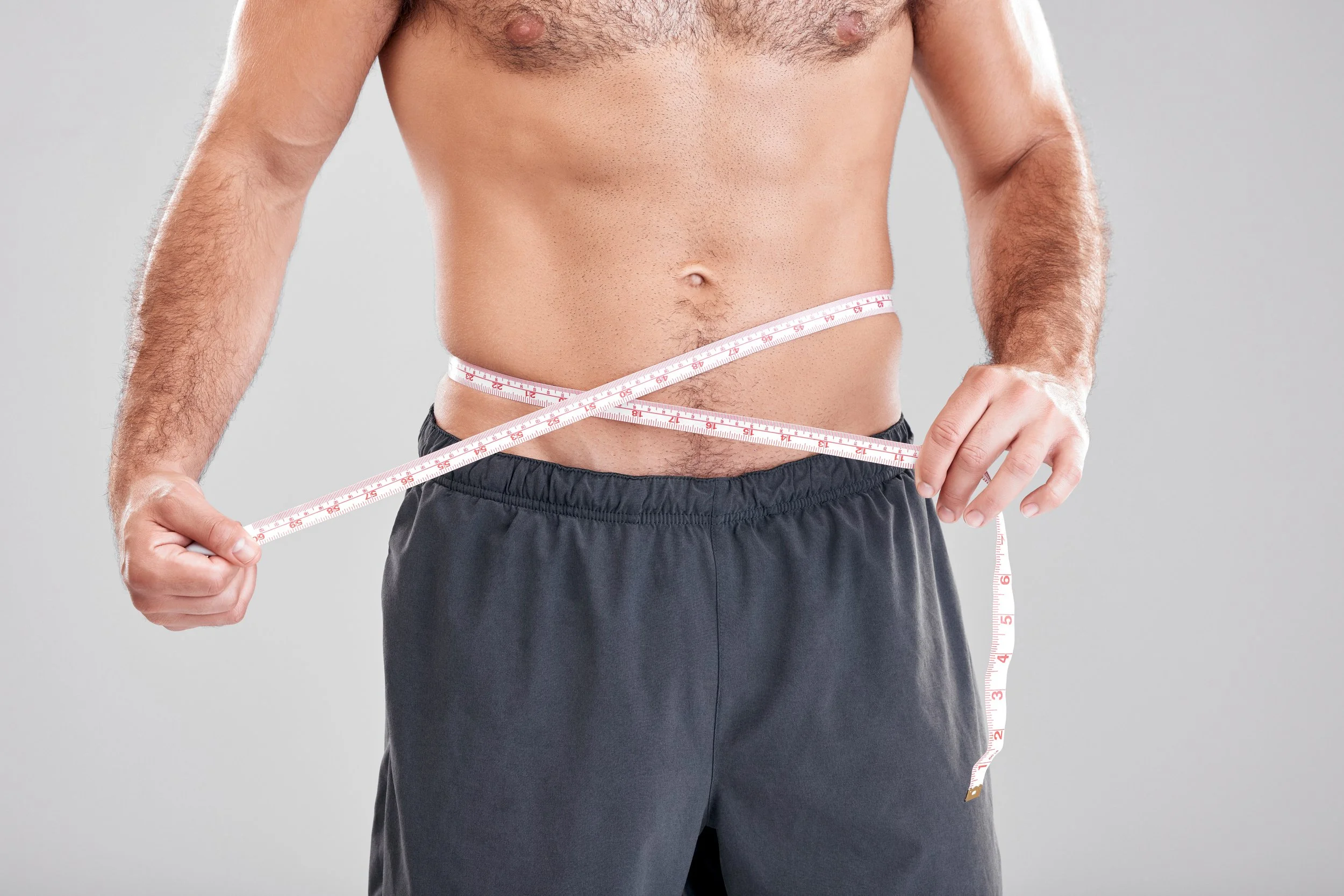 fitness-weightloss-and-man-with-measuring-tape-on-2026-01-09-09-35-34-utc.jpg