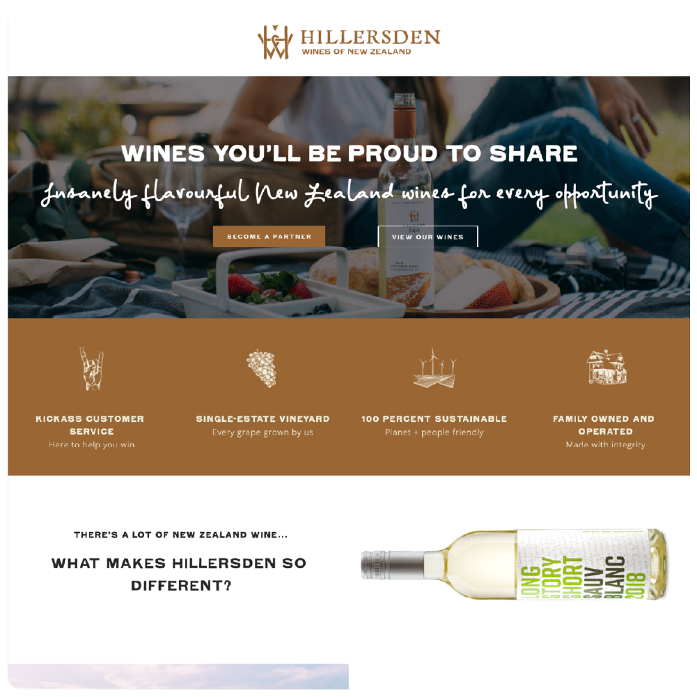 A website homepage for Hillersden Wines of New Zealand, featuring a picnic scene with a person sitting outdoors, offering wine bottles and food, with text promoting New Zealand wines, partnership, and sustainable vineyard practices.
