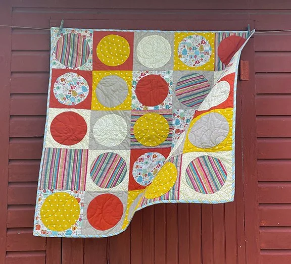 CITS_baby quilt_photo_blowing.jpg