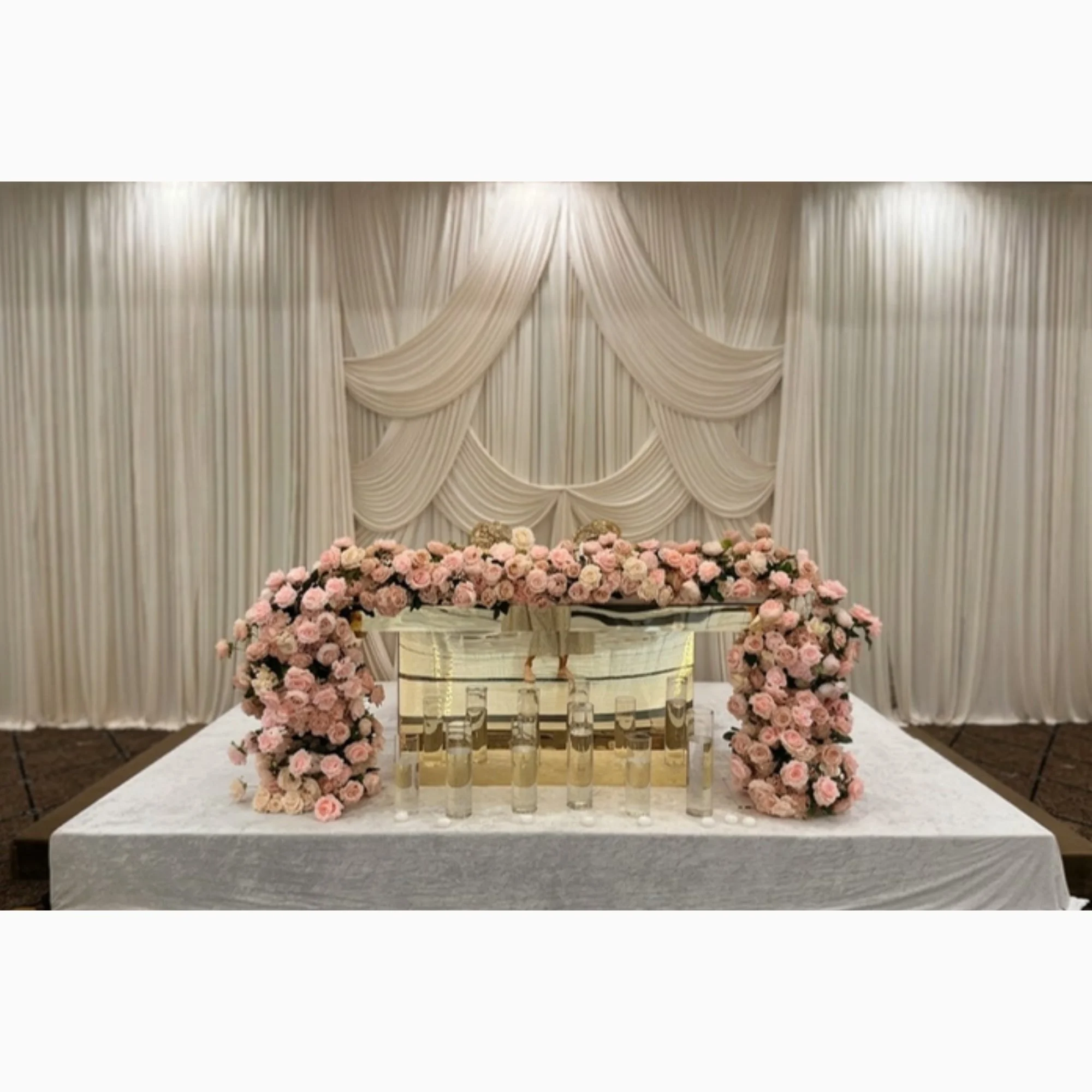 head-table-with-floral-front-and-draping.jpg