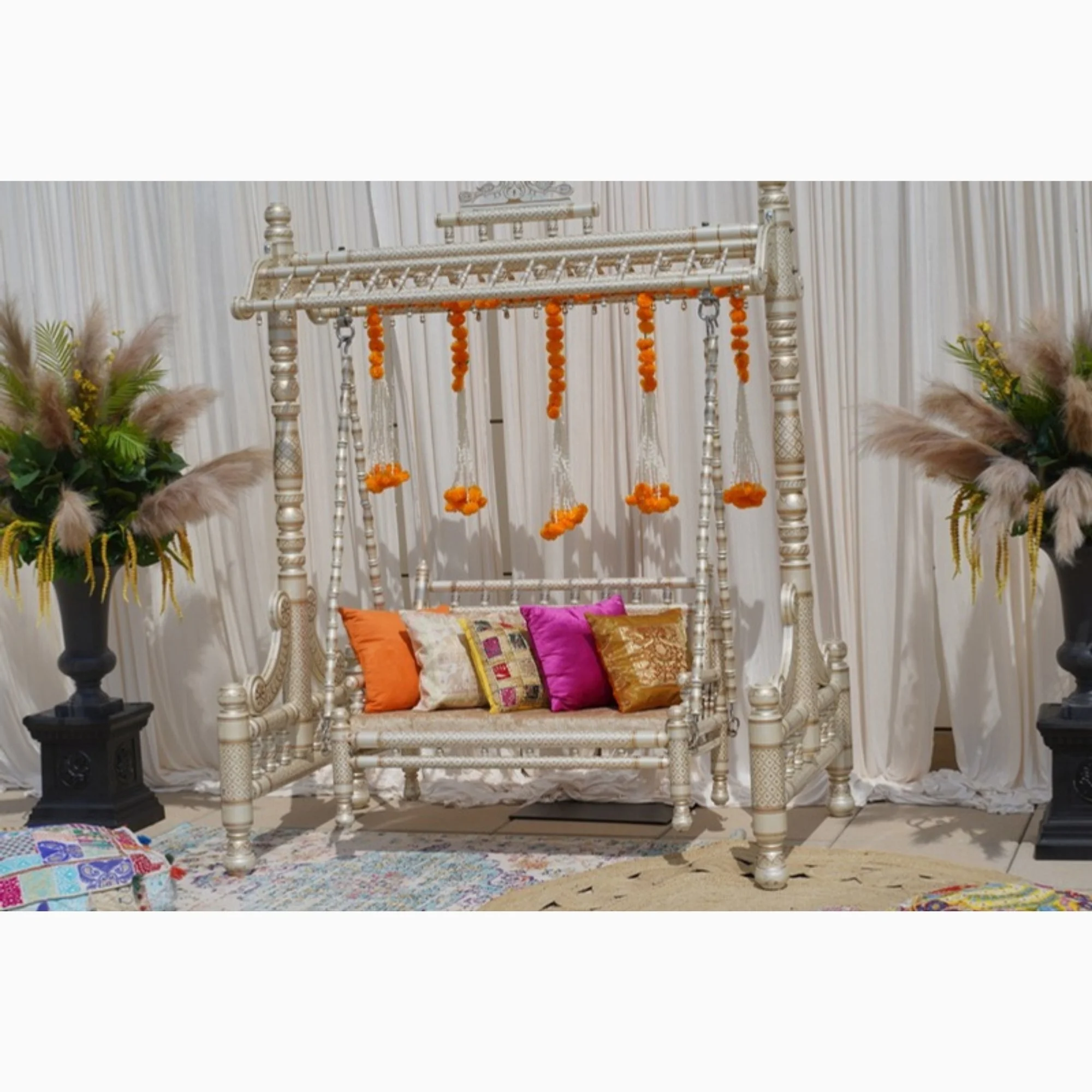 ivory-swing-stage-with-marigolds.jpg