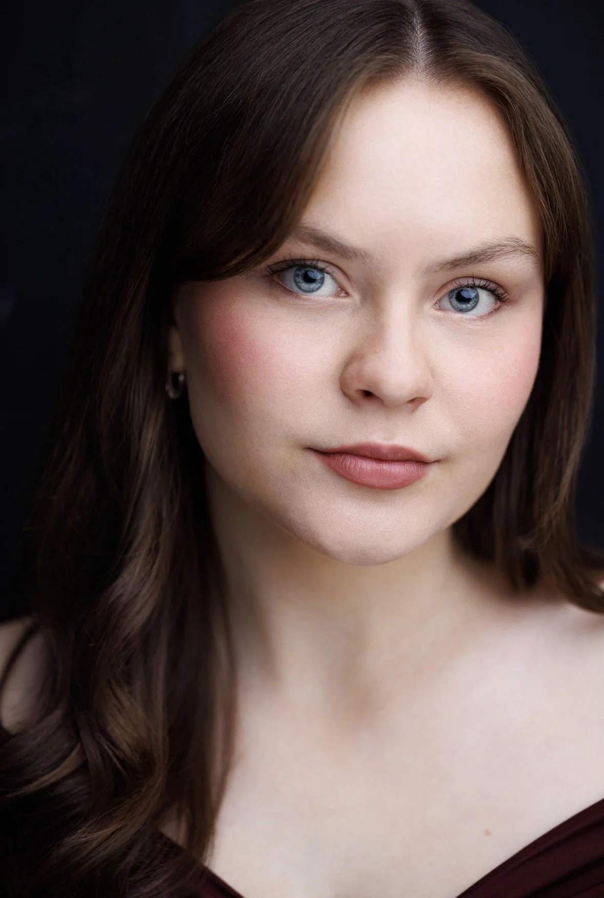 Avis Russey Headshot.jpeg