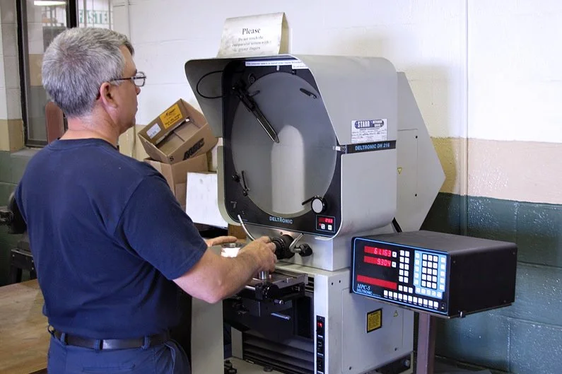 Man using Optical Comparator