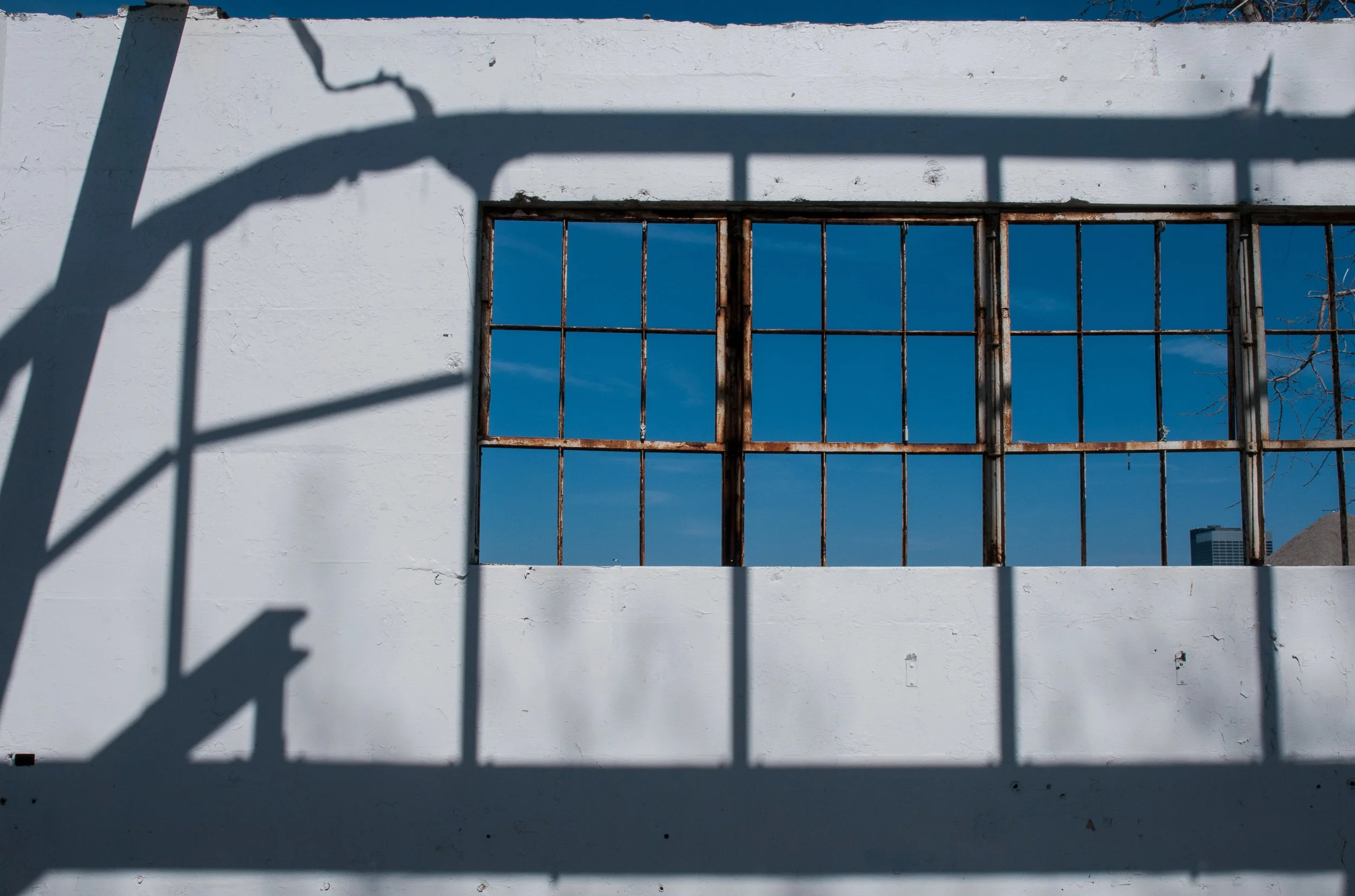 Rusted Window with Shadow