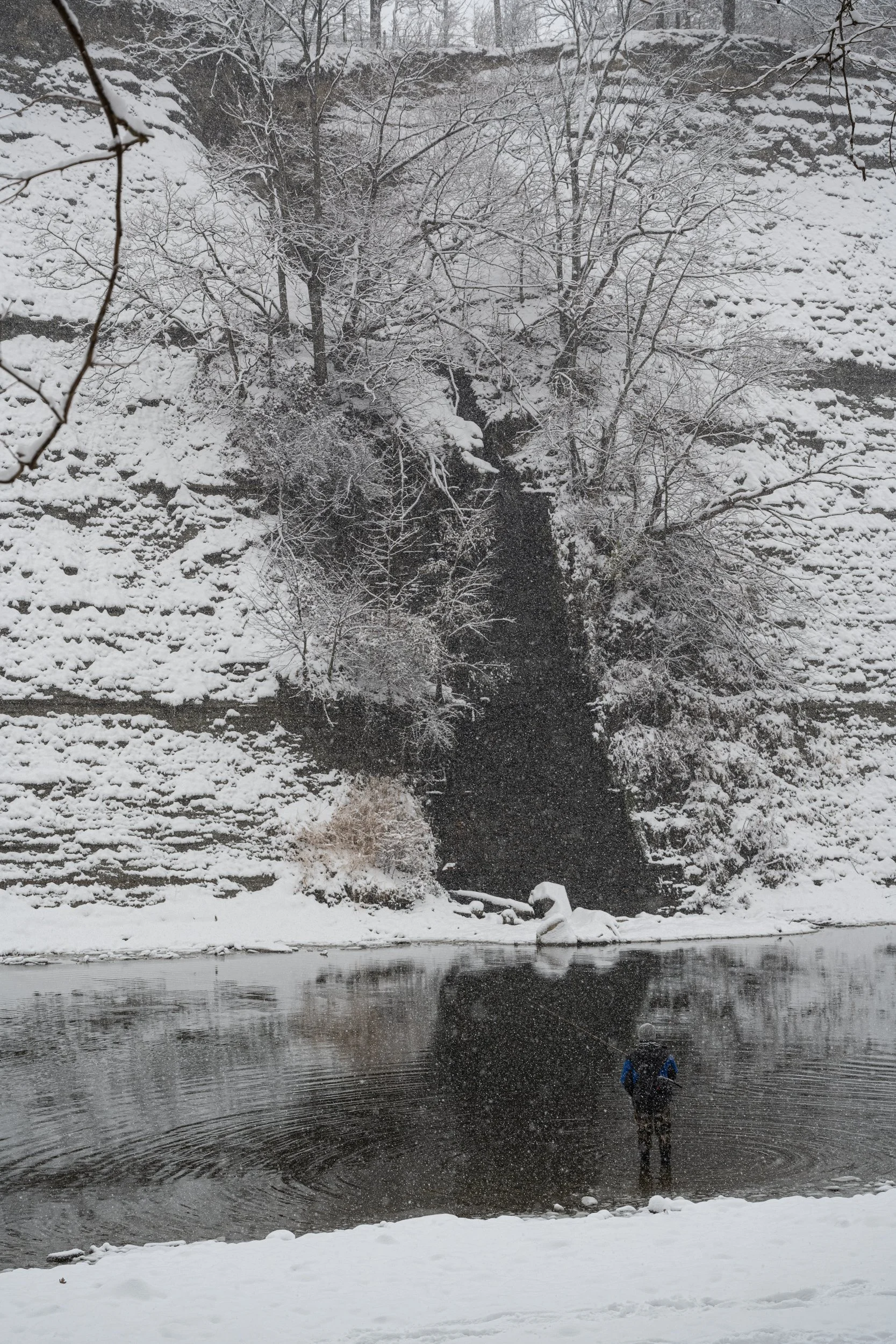 Fisherman in Heavy Snow