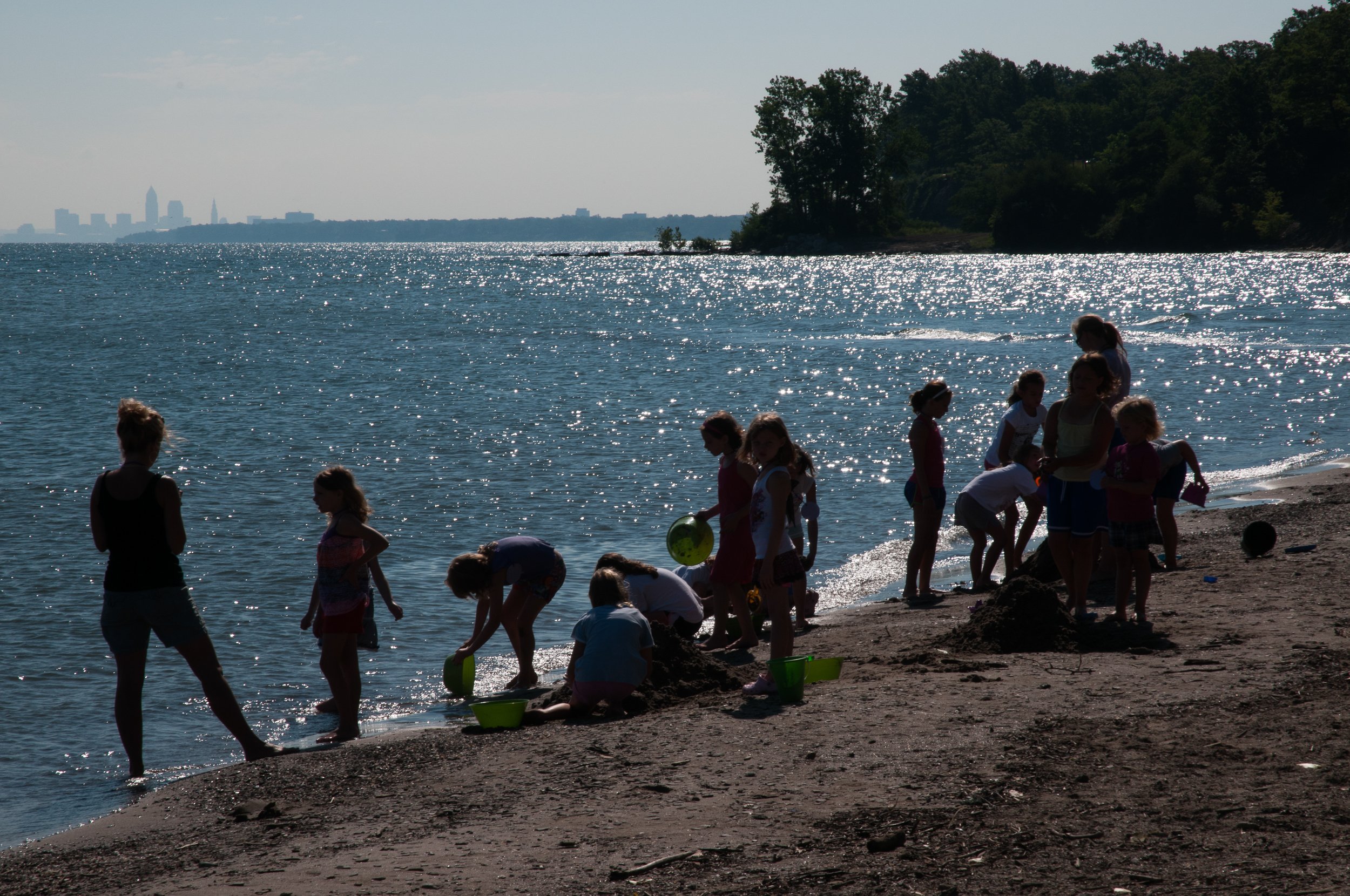 Silhouetted Children on the Beach