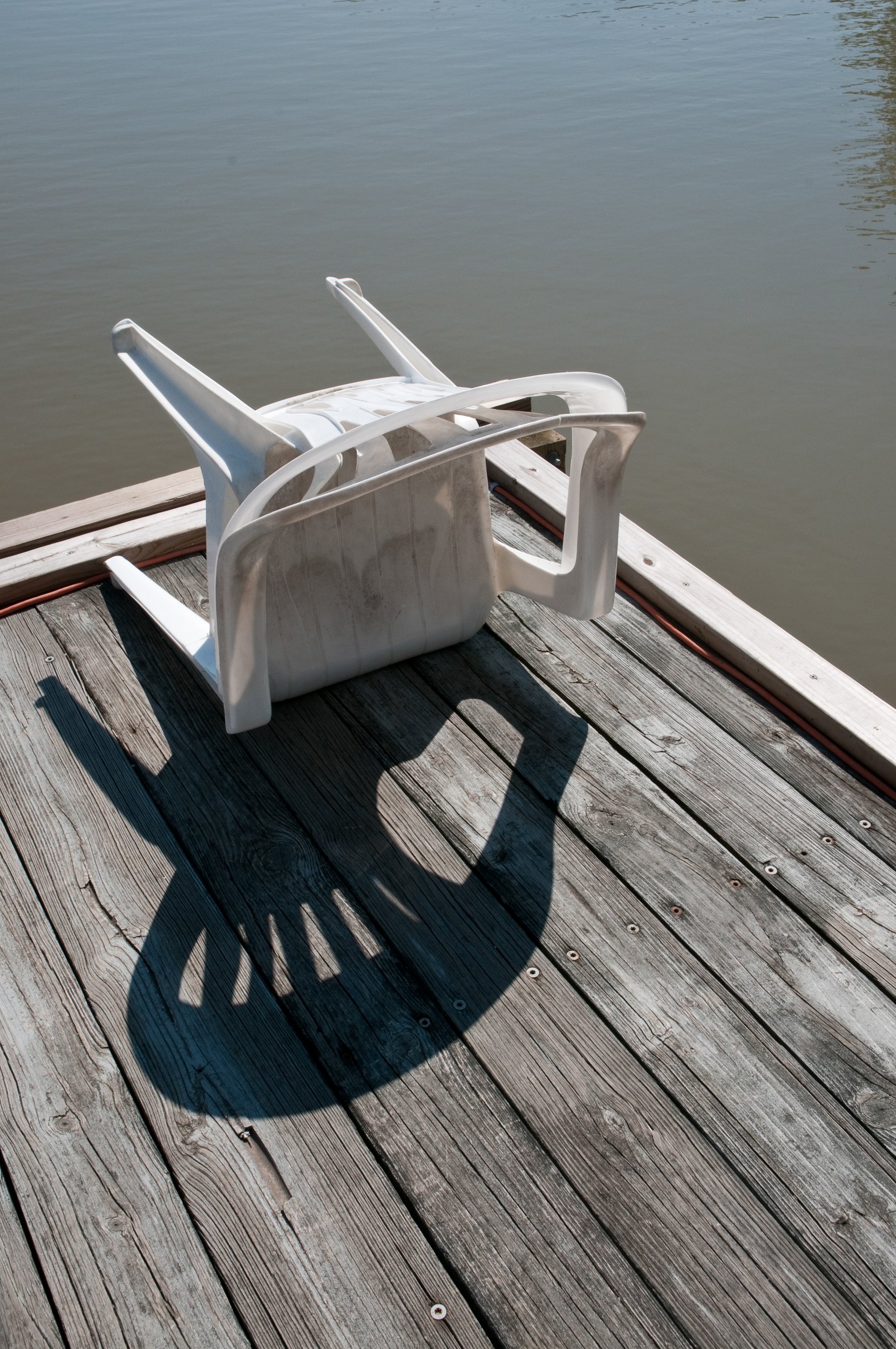 Plastic Chair on Dock w/Shadow