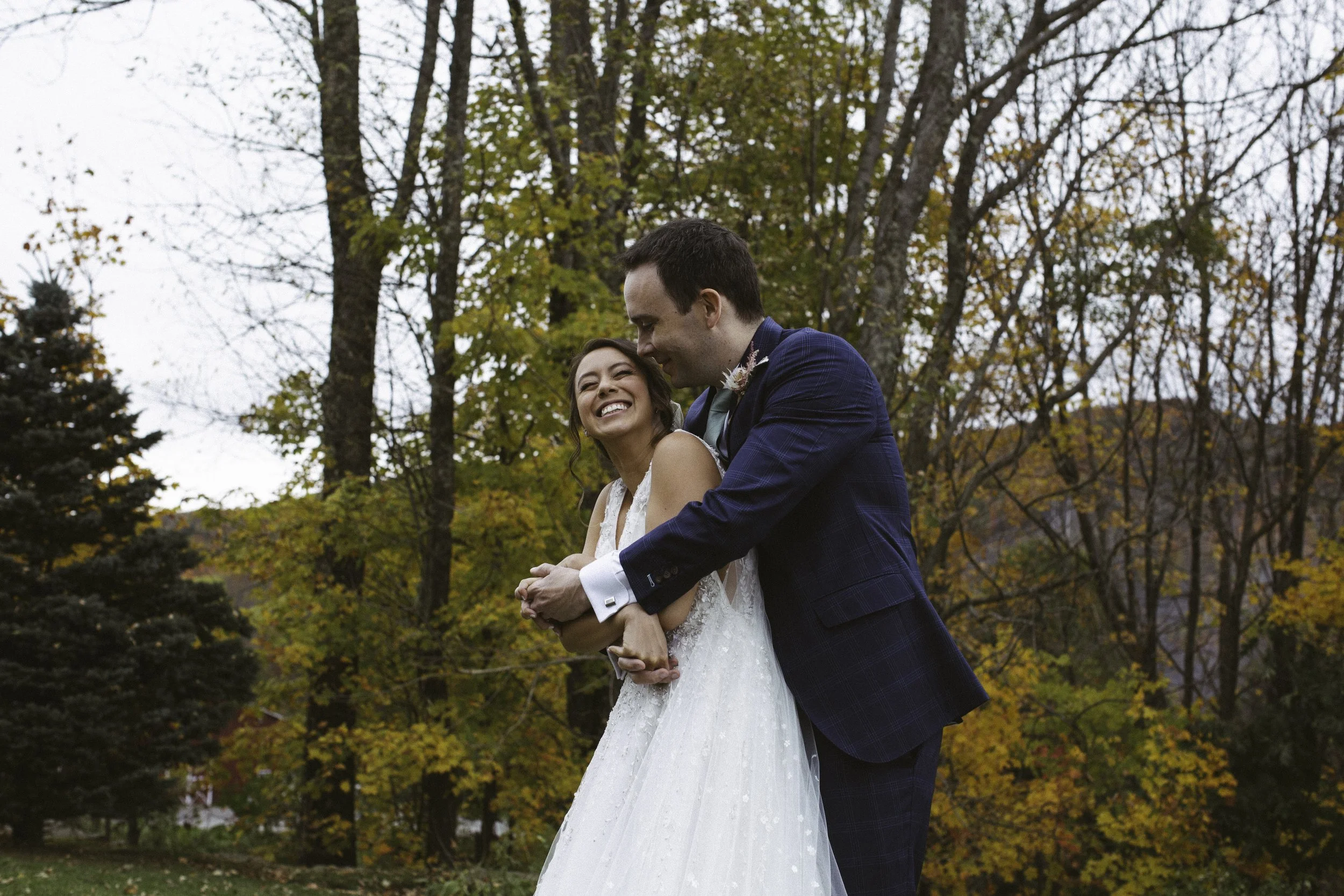 Bride and groom portrait with autumn foliage in upstate New York — New York City wedding photographer