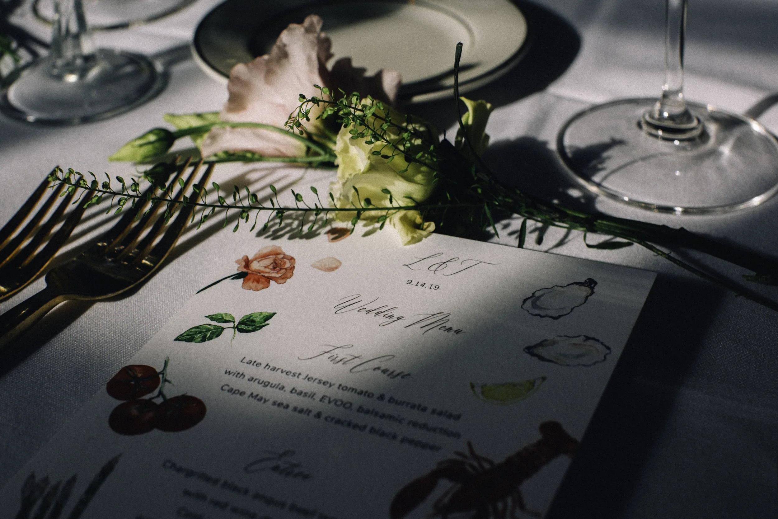Wedding reception table setting with flowers and menu — NYC wedding photography