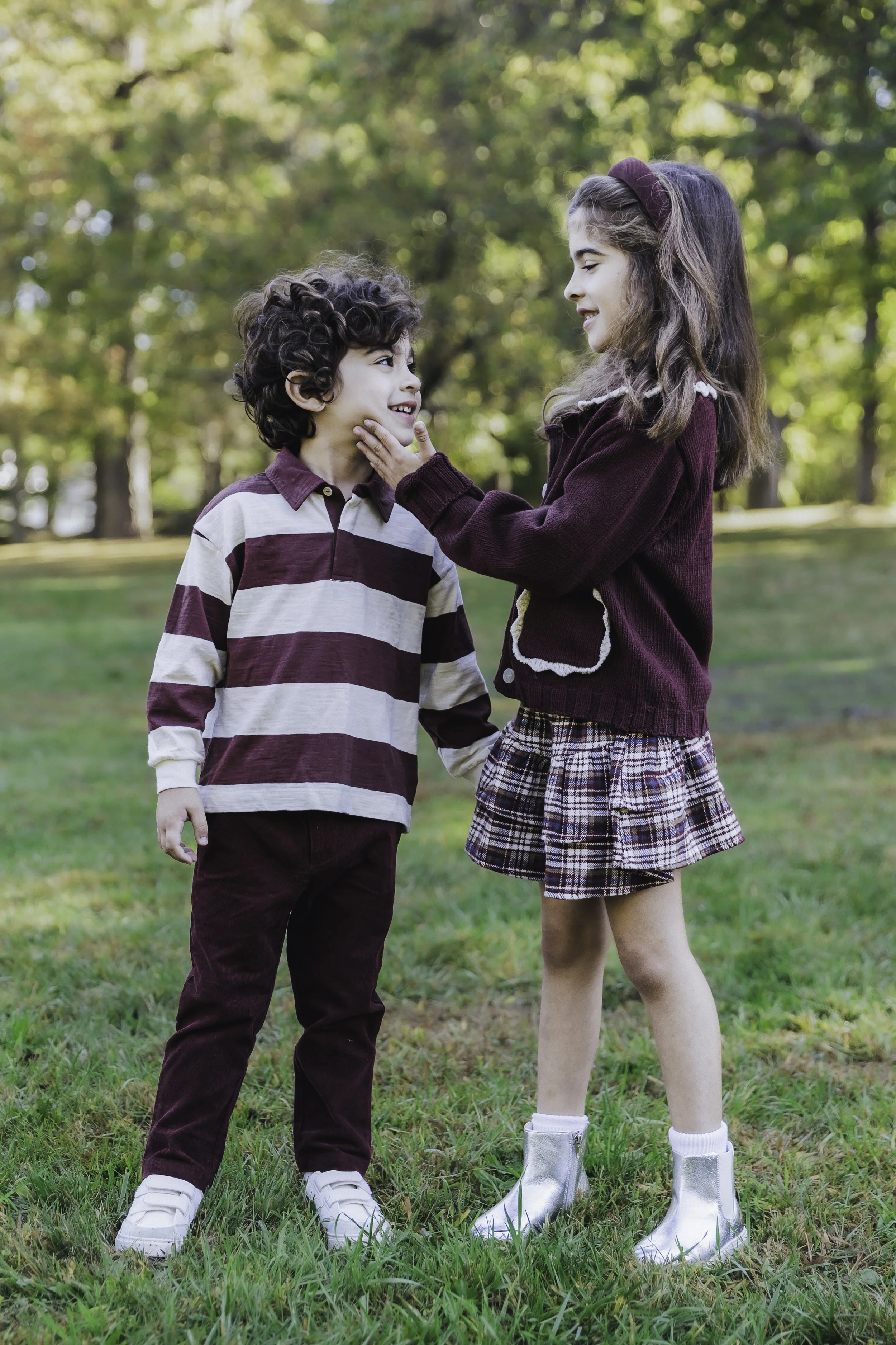 SIbling photo in Bruce Park. Documentary family photographer in New York City 