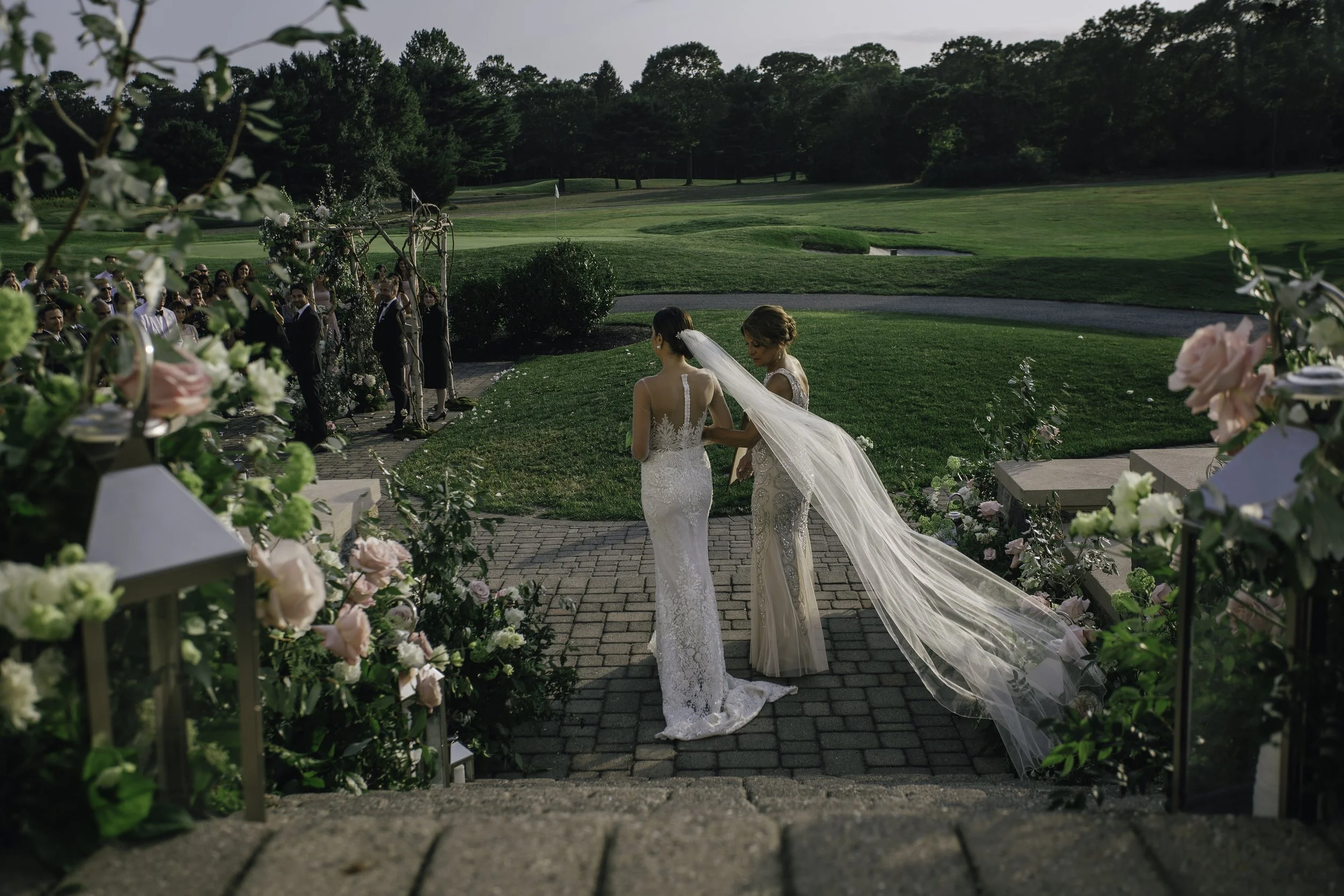 Bride and mother of the bride at outdoor ceremony — New York City wedding photography