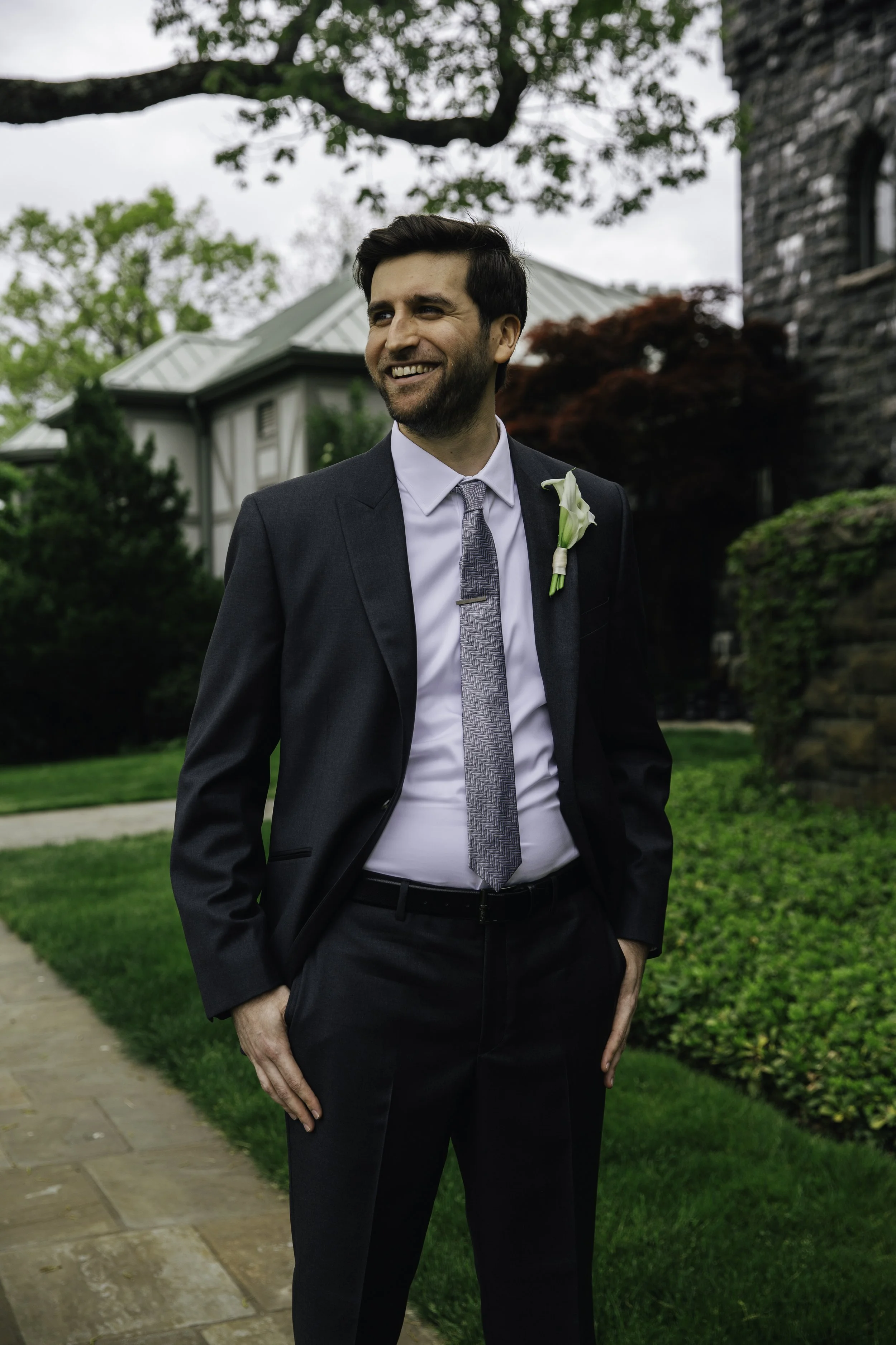 Groom portrait outdoors with greenery — New York City wedding photographer