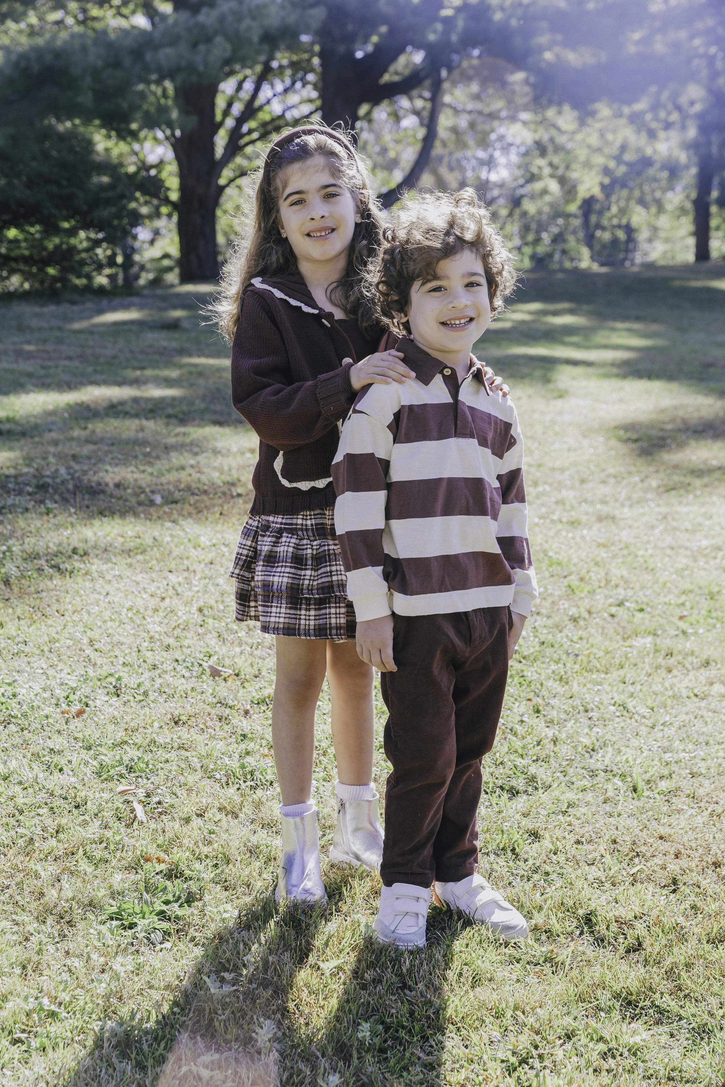 SIbling photo in Bruce Park. Documentary family photographer in New York City 