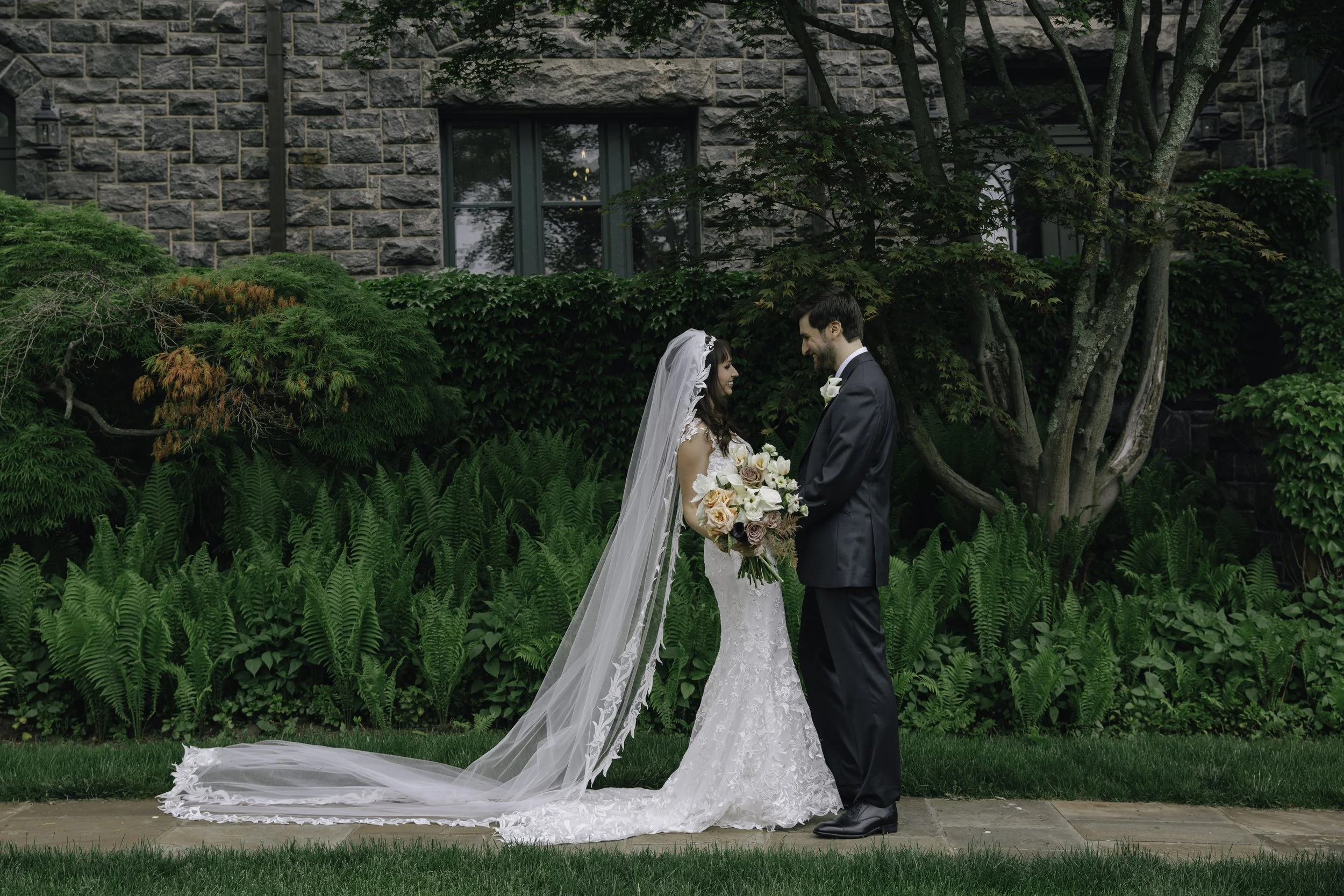 Bride and groom outdoors holding hands — New York City wedding photographer