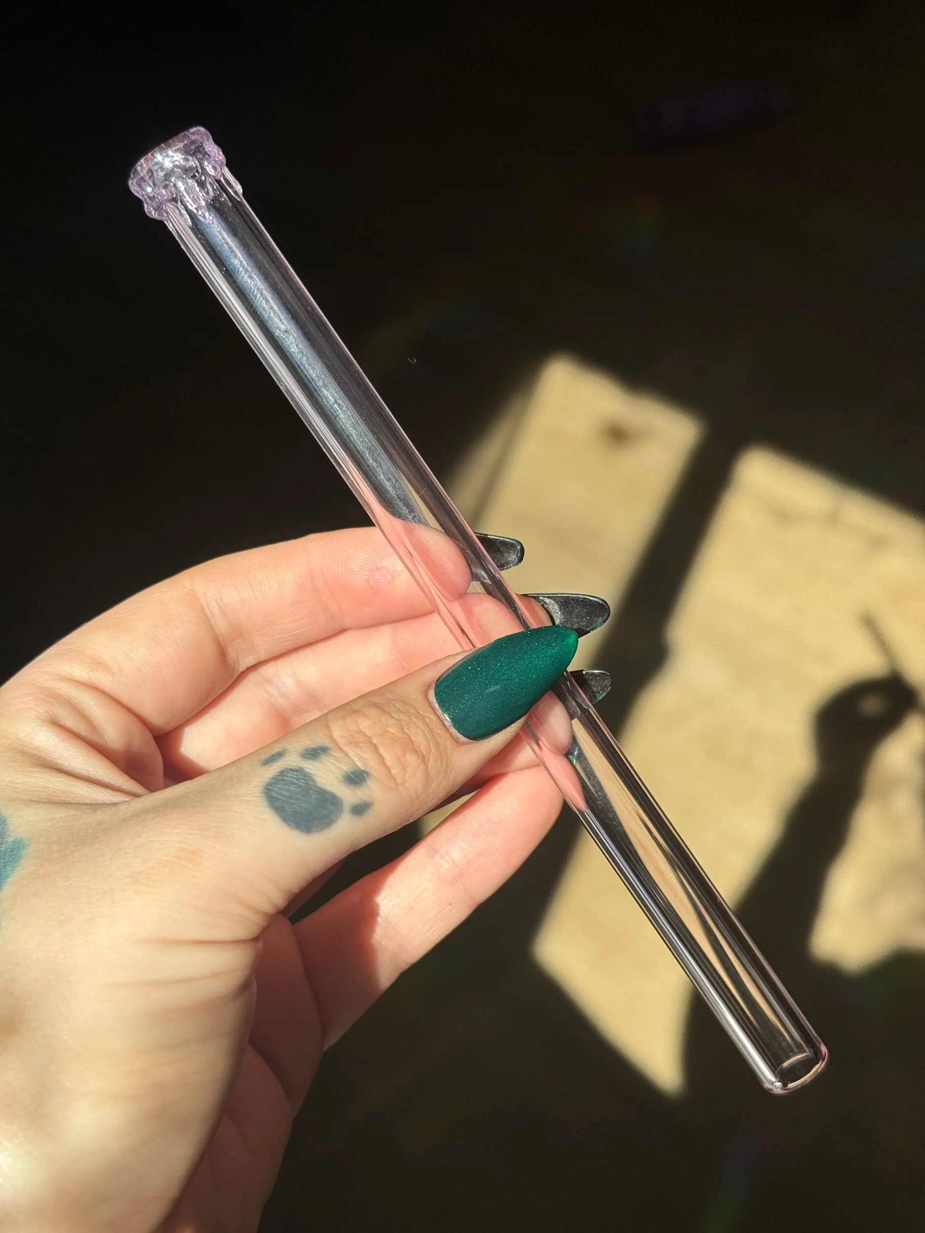 Pink glass straw with melted lip design
