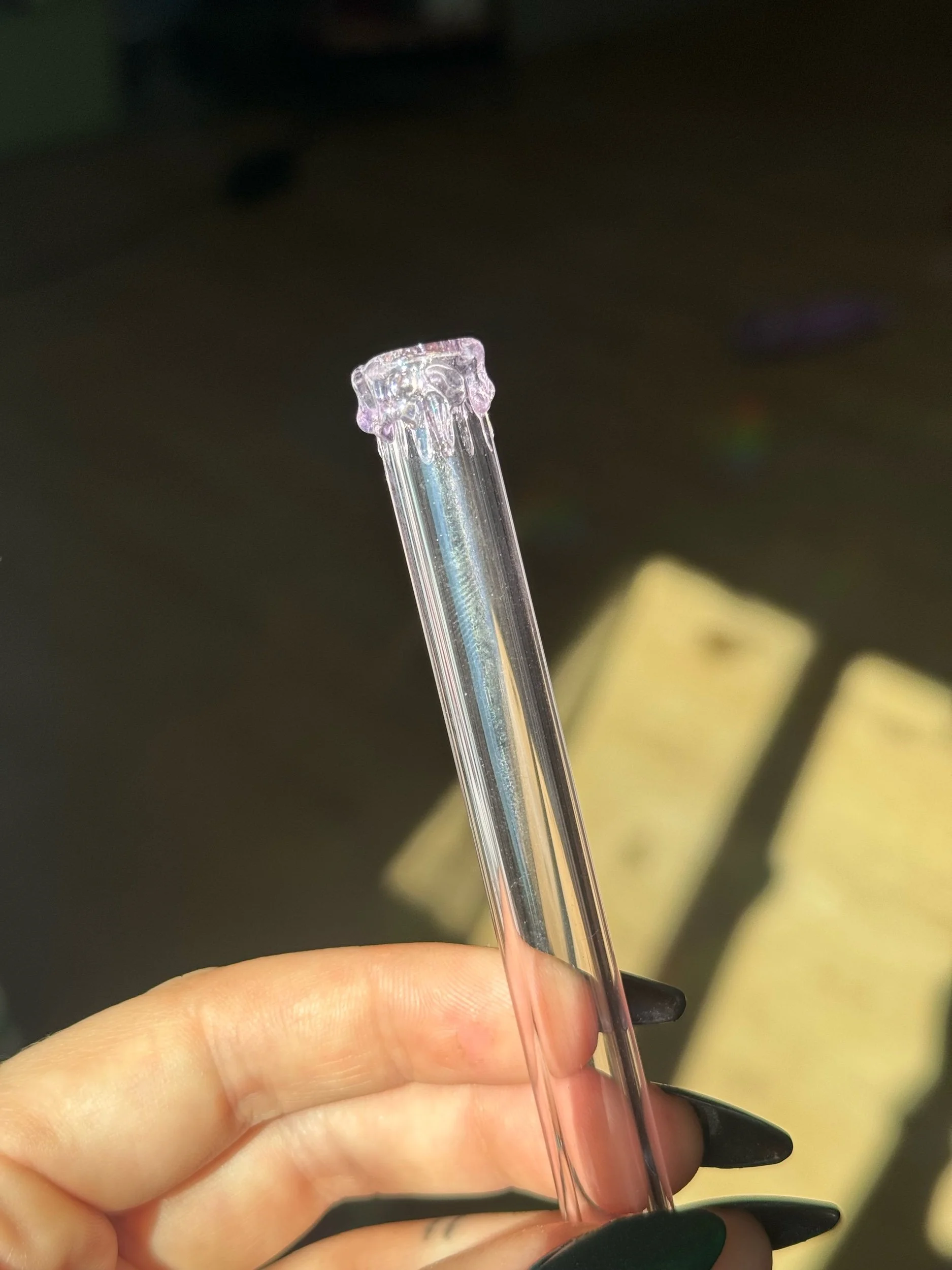 Pink glass straw with melted lip design