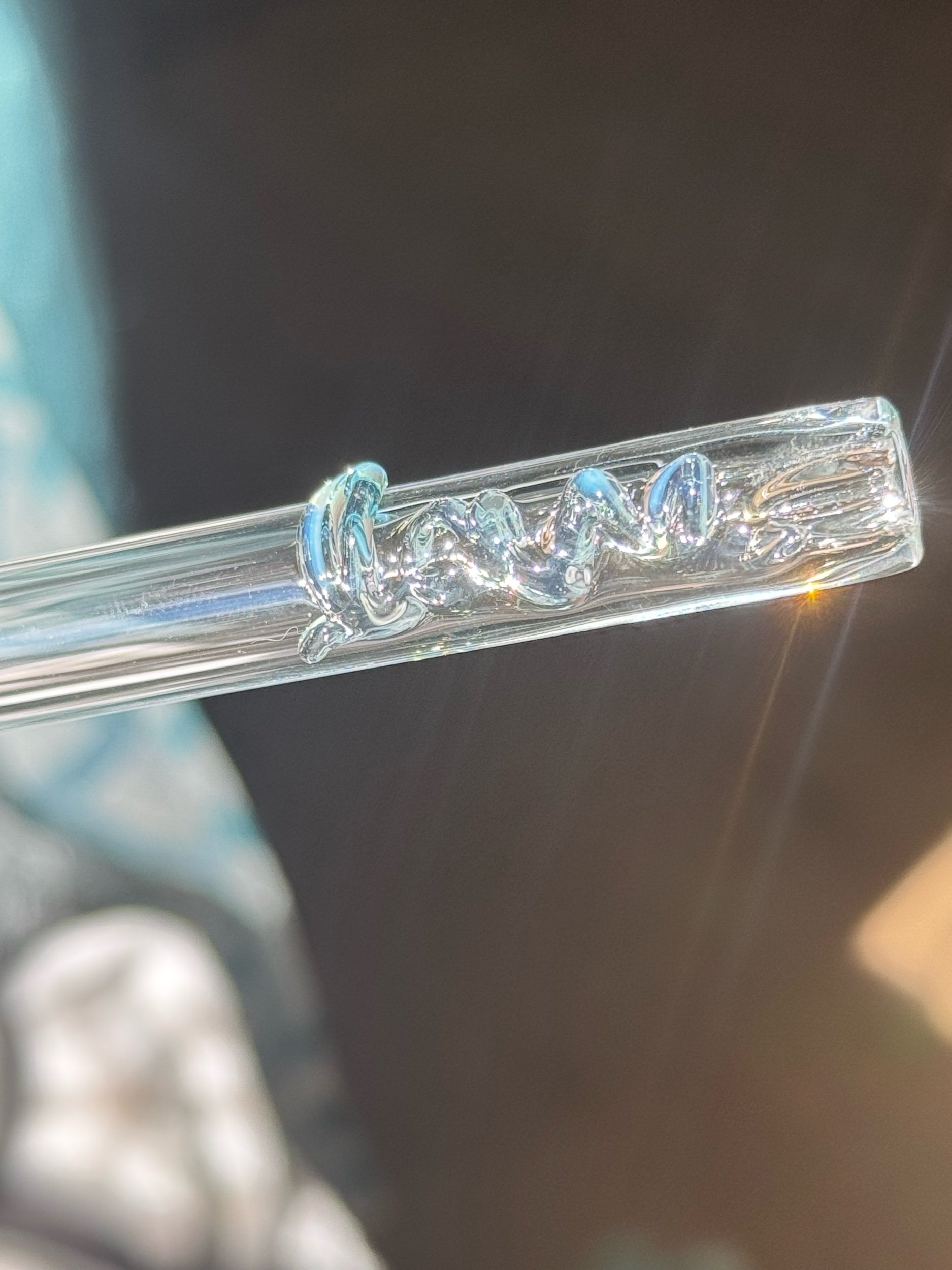 Clear glass straw with blue cursive love design